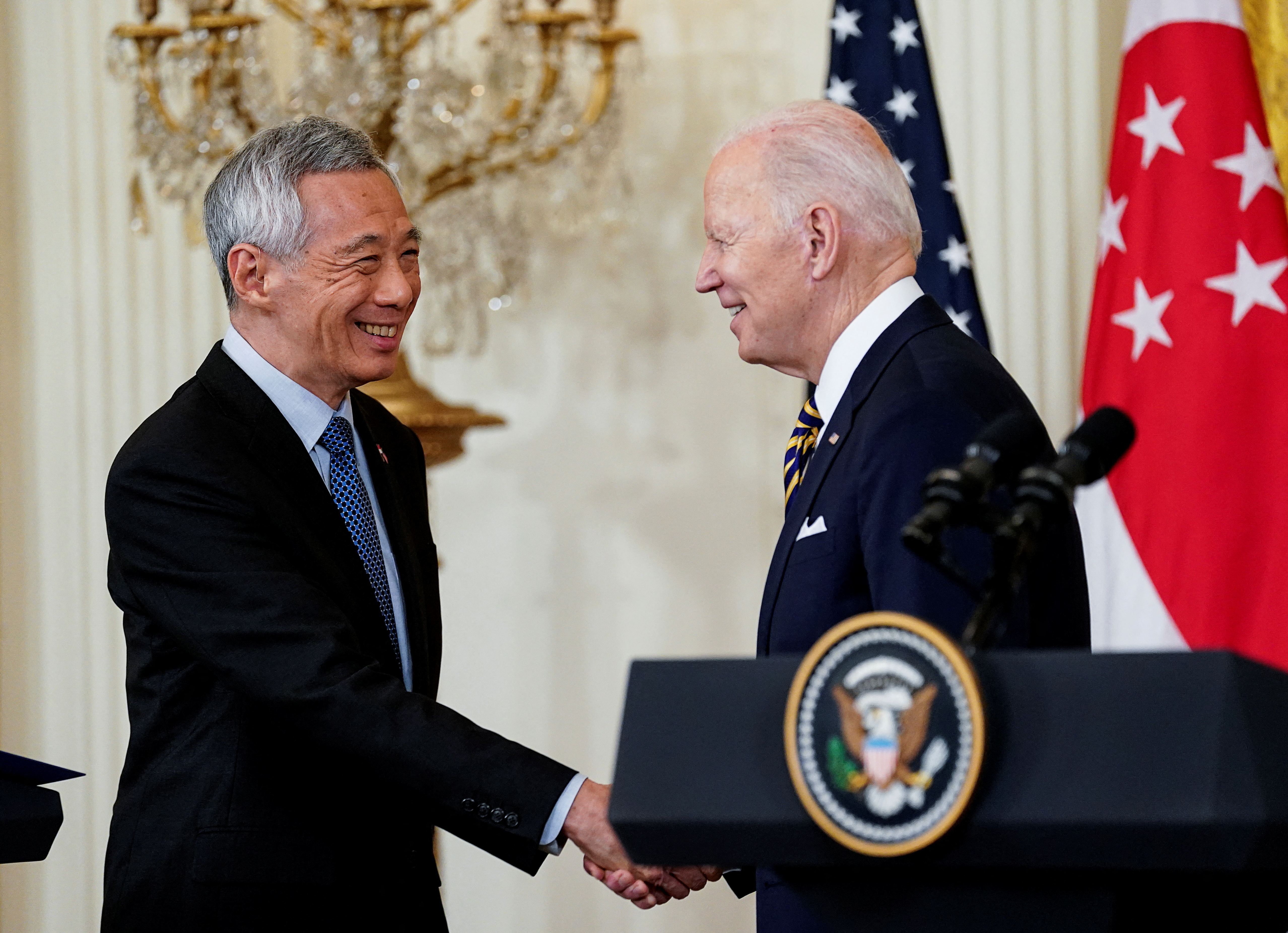US President Biden greets Singapore PM Lee