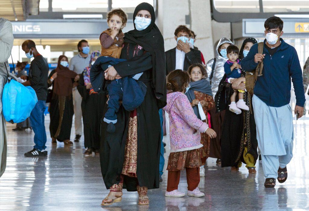 Afghan families arrive at airport in US