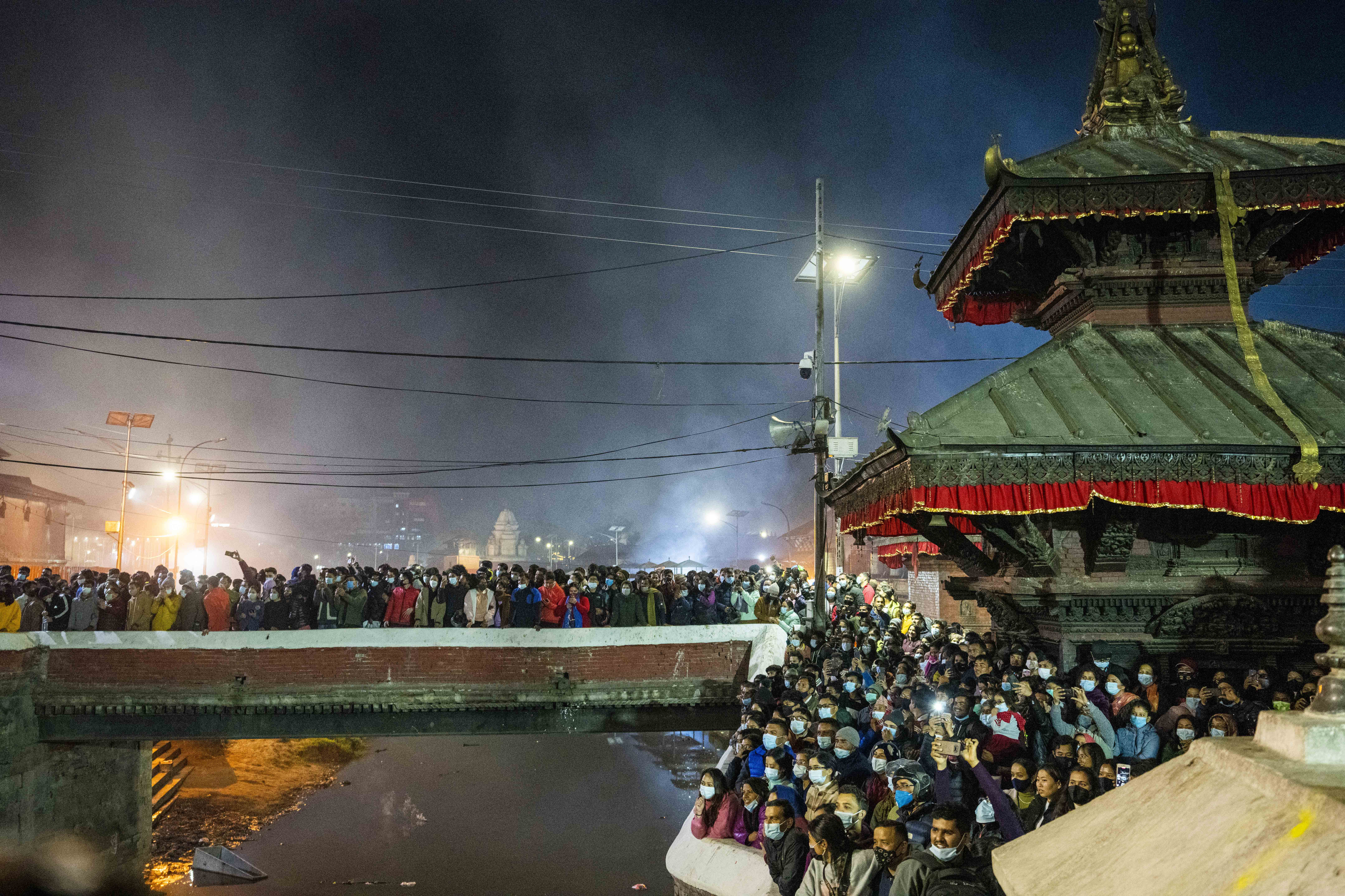 Nepalese people throng the Pashupatinath temple premises