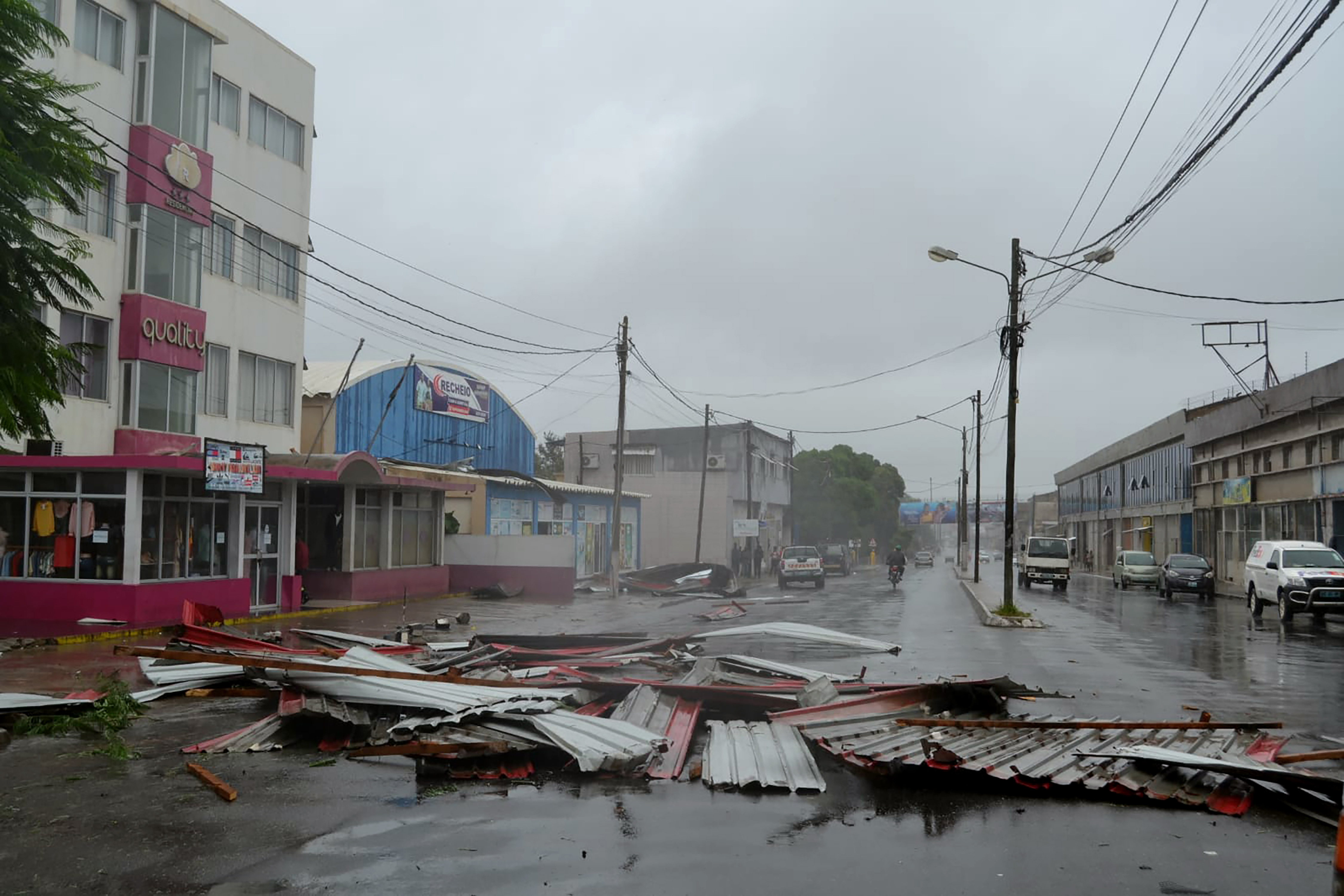 Debris lays strewn on a road in Nampula Province, Mozambique, Saturday, March 12, 2022. Officials in Mozambique say that Cyclone Gombe has flooded large areas of northern and central Mozambique