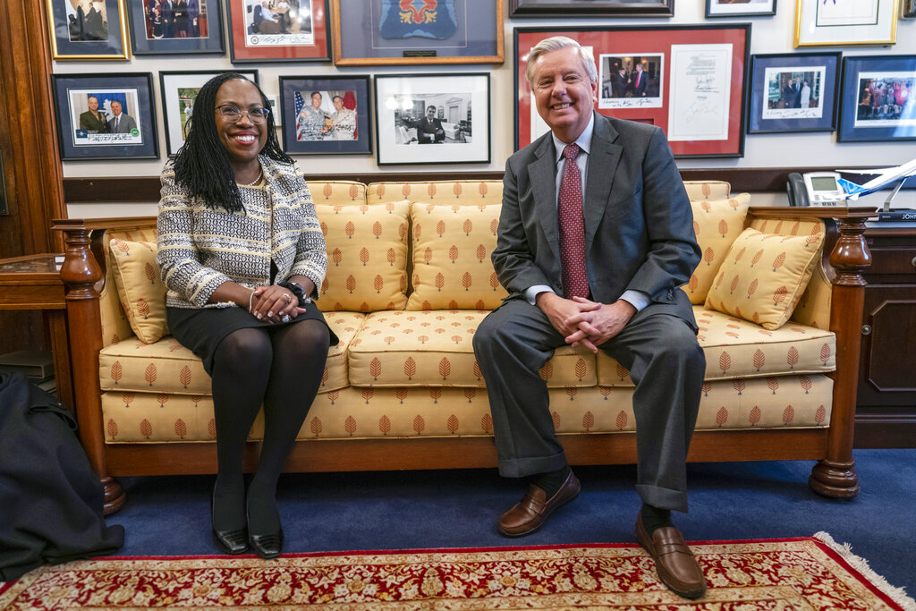 All smiles as Supreme Court nominee Ketanji Brown Jackson and Republican Senator Lindsey Graham meet in his Capitol Hill office.