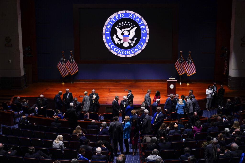 Senate Minority Leader Mitch McConnell of Ky., center, and others arrive to hear Ukrainian President Volodymyr Zelenskyy speak to the U.S. Congress by video at the Capitol in Washington, DC.