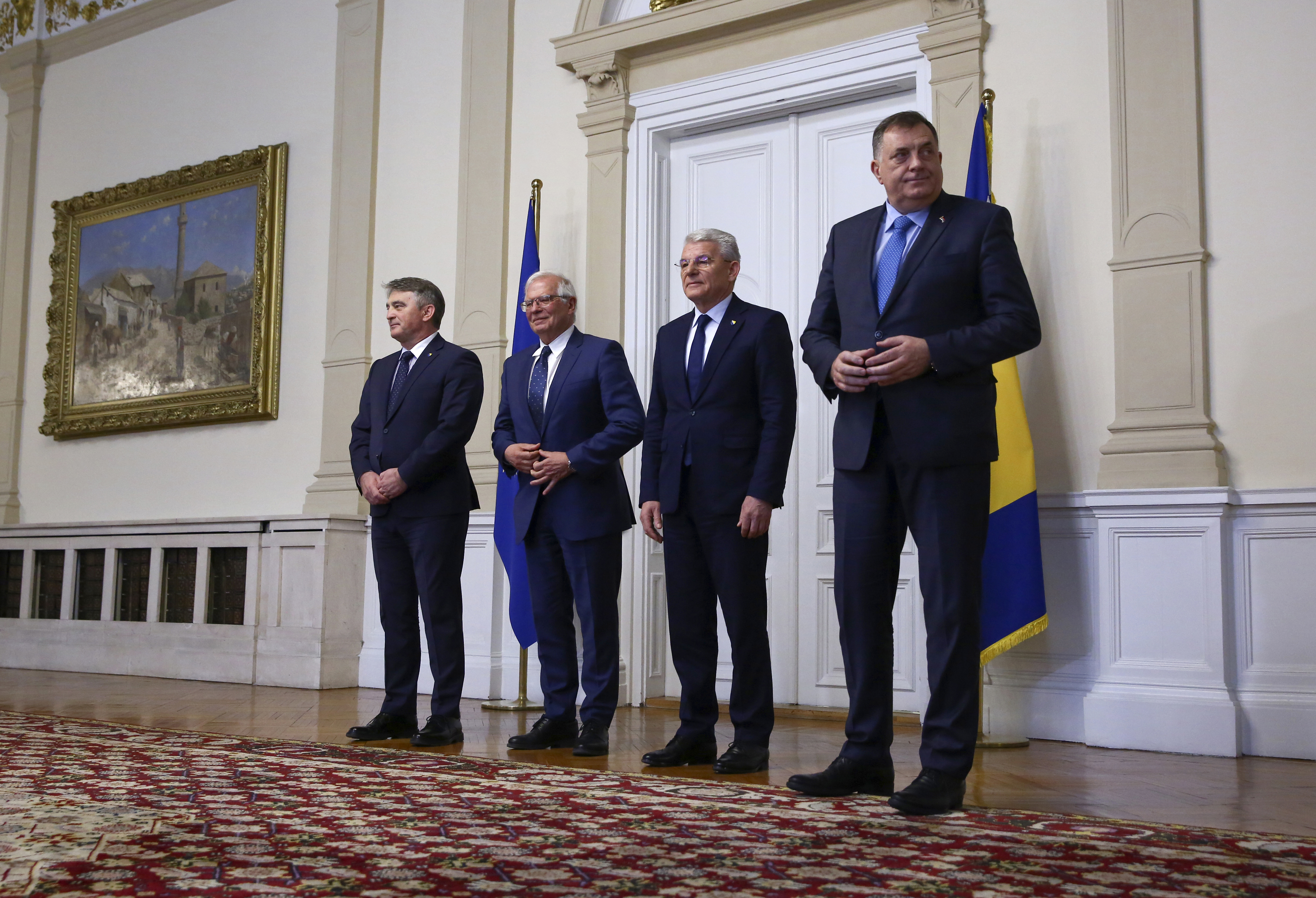 European Union's foreign policy chief Josep Borrell, second left, poses with Croat member of the tripartite Presidency of Bosnia Zeljko Komsic, left, Muslim member of the tripartite Presidency of Bosnia Sefik Dzaferovic, second right, and Bosnian Serb member of the tripartite Presidency of Bosnia Milorad Dodik in the capital Sarajevo
