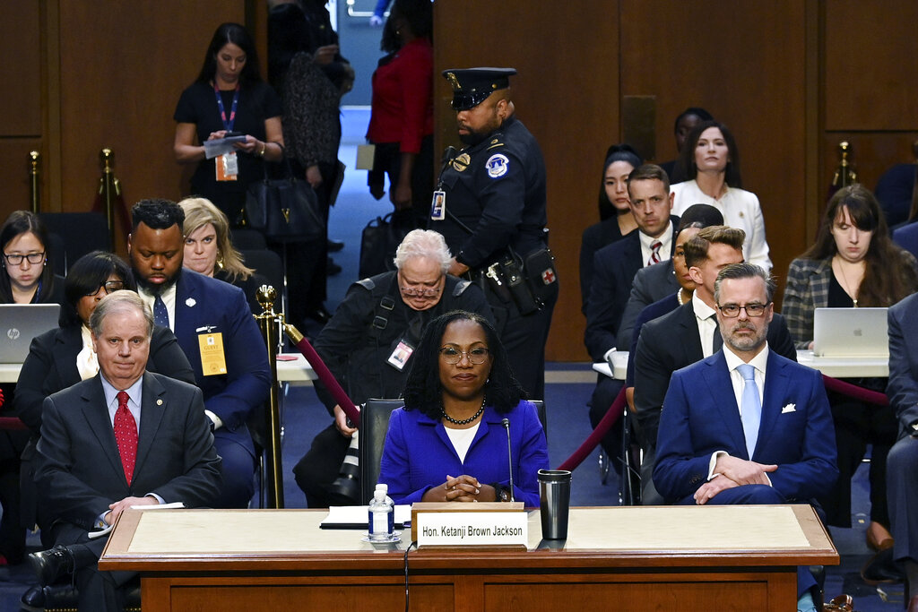 Supreme Court nominee Ketanji Brown Jackson listens to opening statements during her confirmation hearing before the Senate Judiciary Committee.