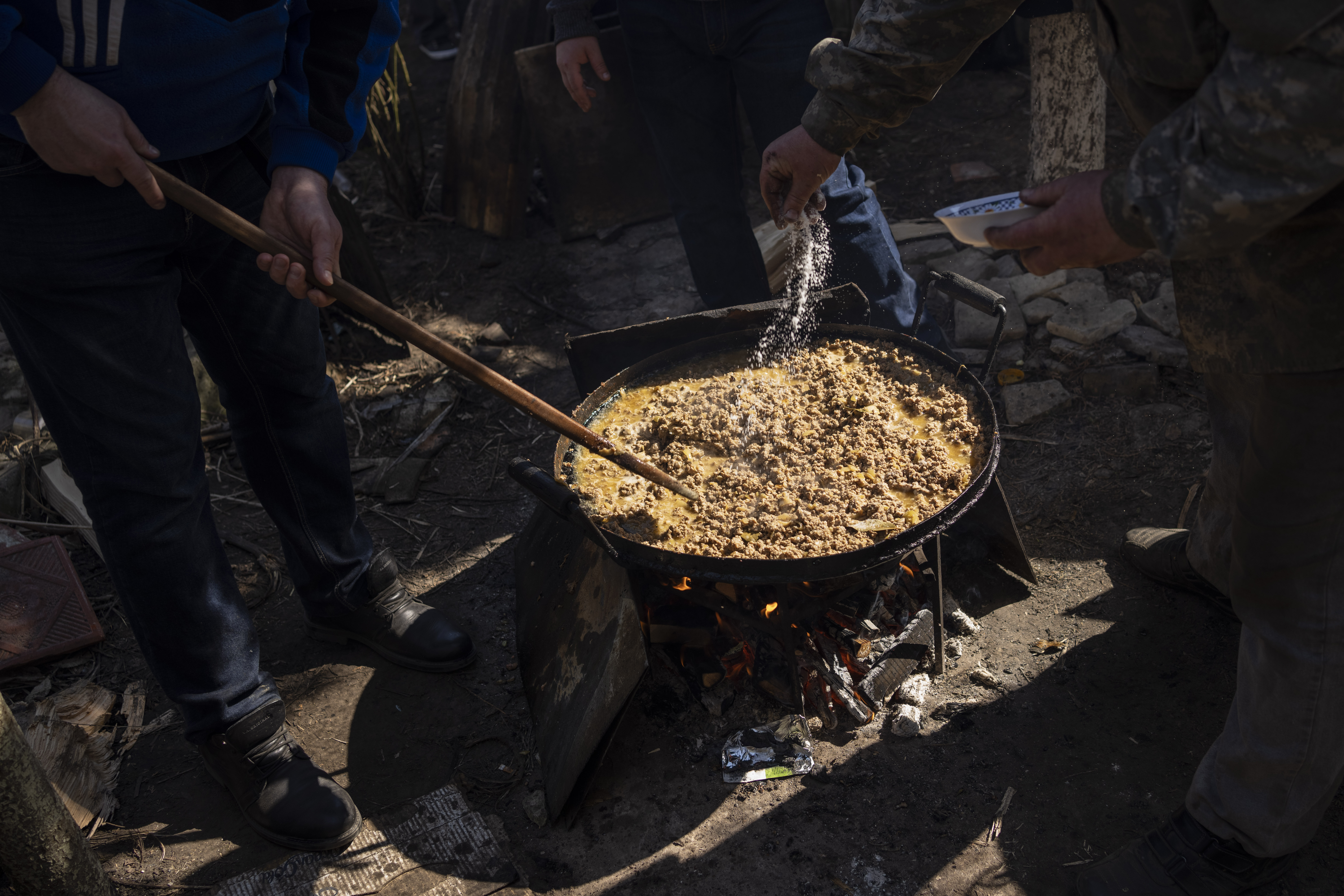 Volunteers cook in the courtyard of a theatre in the city of Drohobych