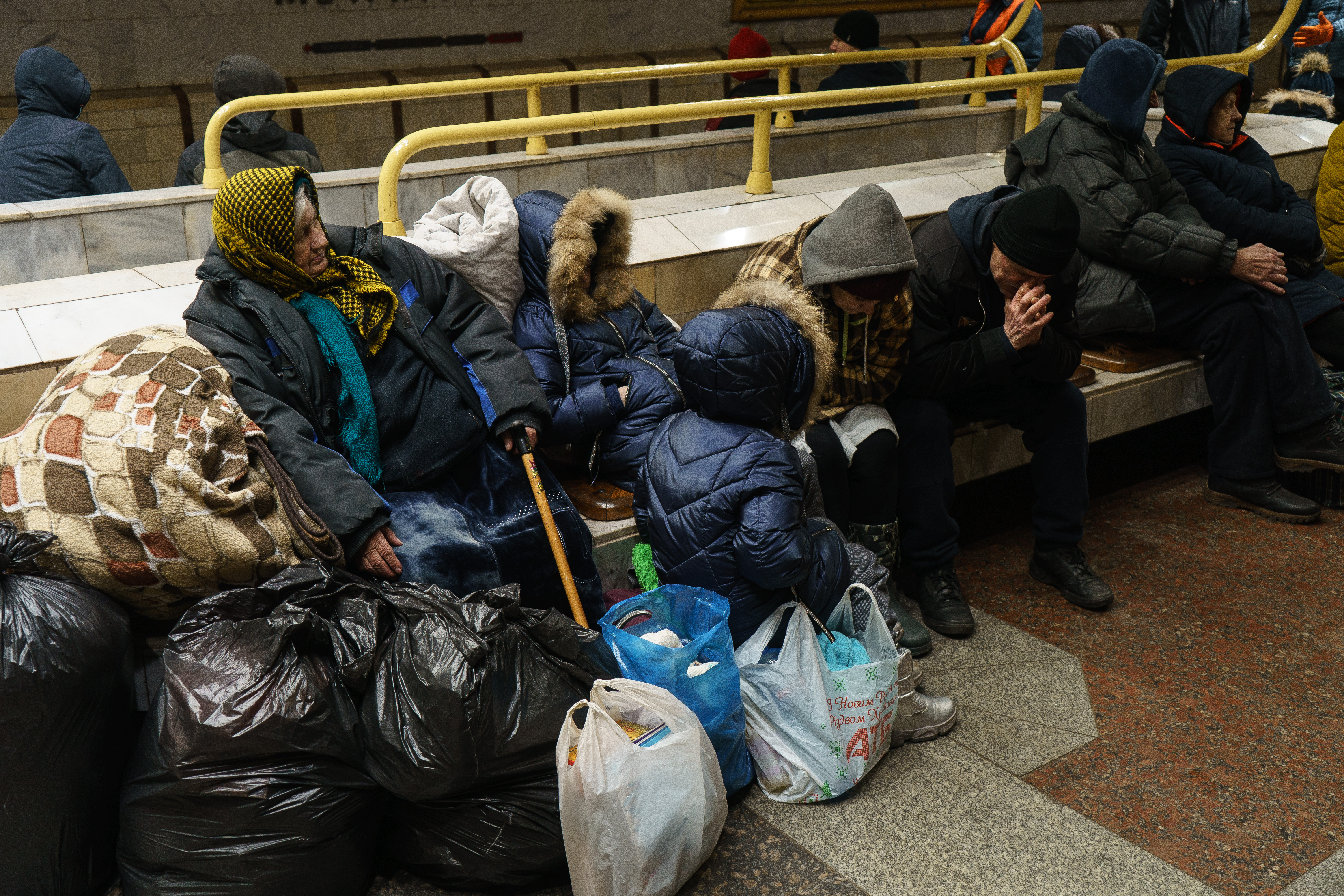 Family shelters in metro station during the sirens