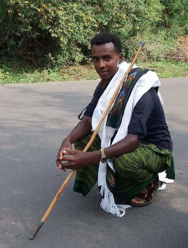 Ayele Aragie, left, and his cousin, Demissie Wubo, to the right, say they were murdered by fighters loyal to the Tigray People's Liberation Front (TPLF) on the outskirts of Woldia, Ethiopia