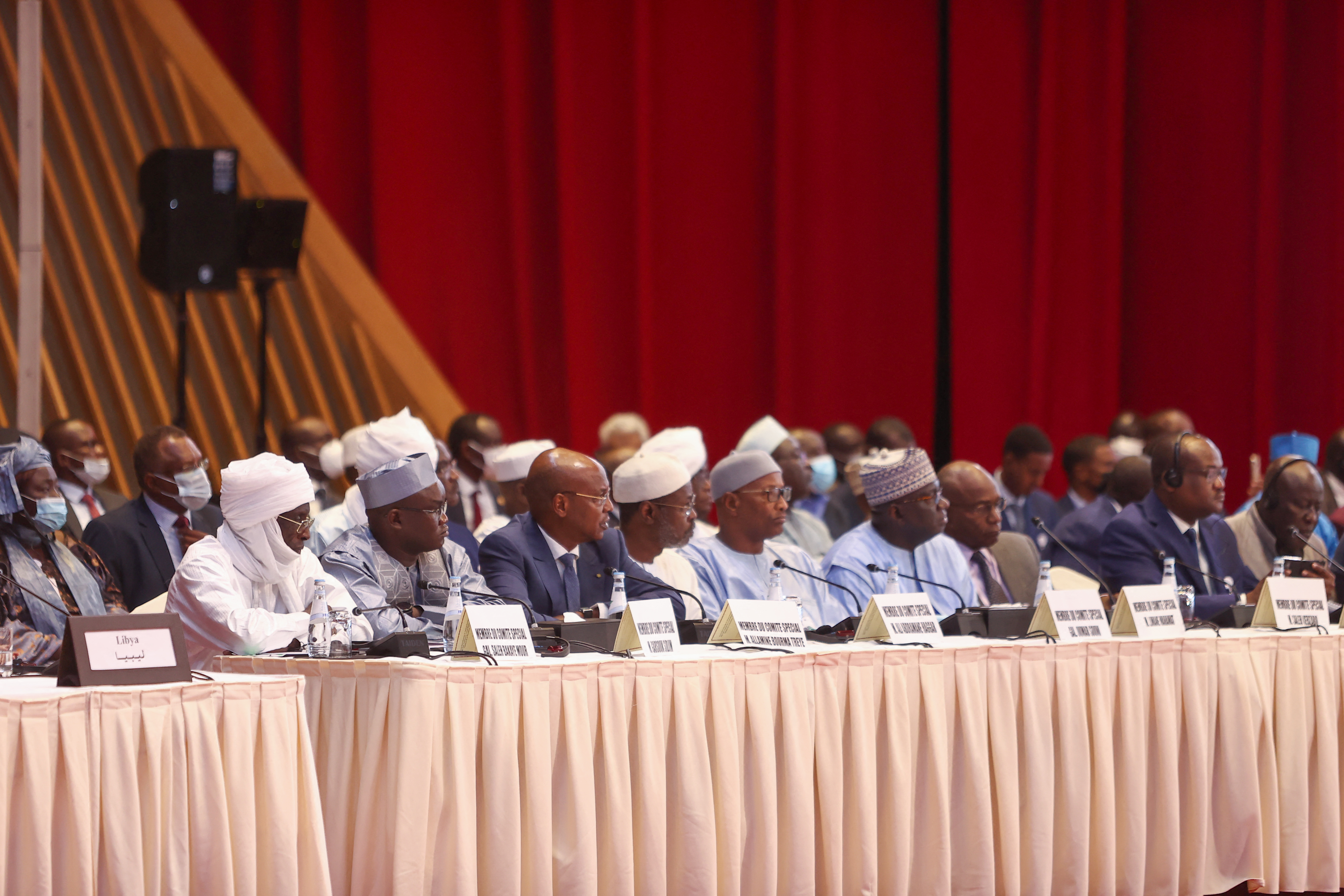 Participants listen to a speech as the Chad Peace Negotiations start in Qatar's capital Doha