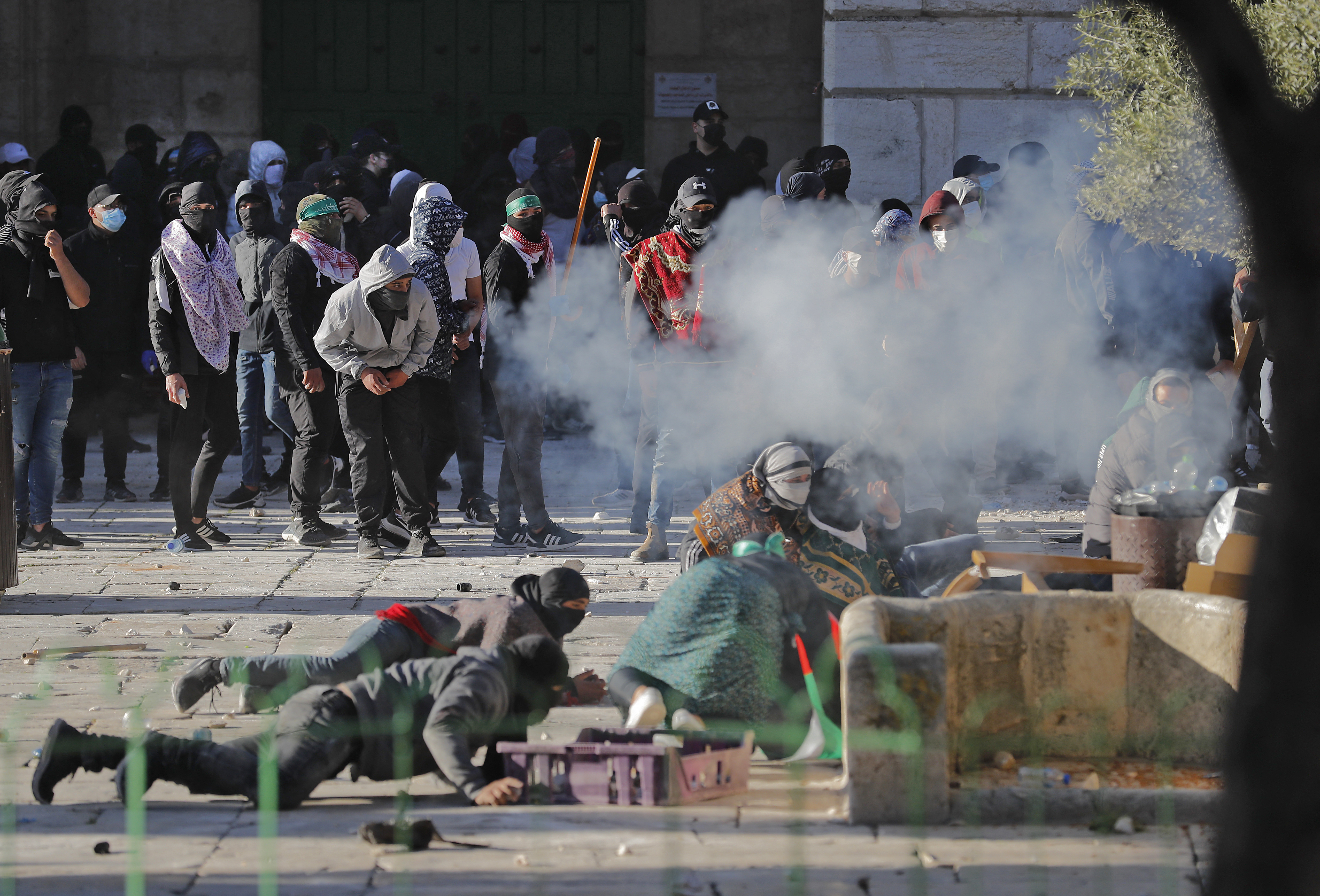 Palestinian demonstrators clash with Israeli police at Jerusalem's Al-Aqsa Mosque compound