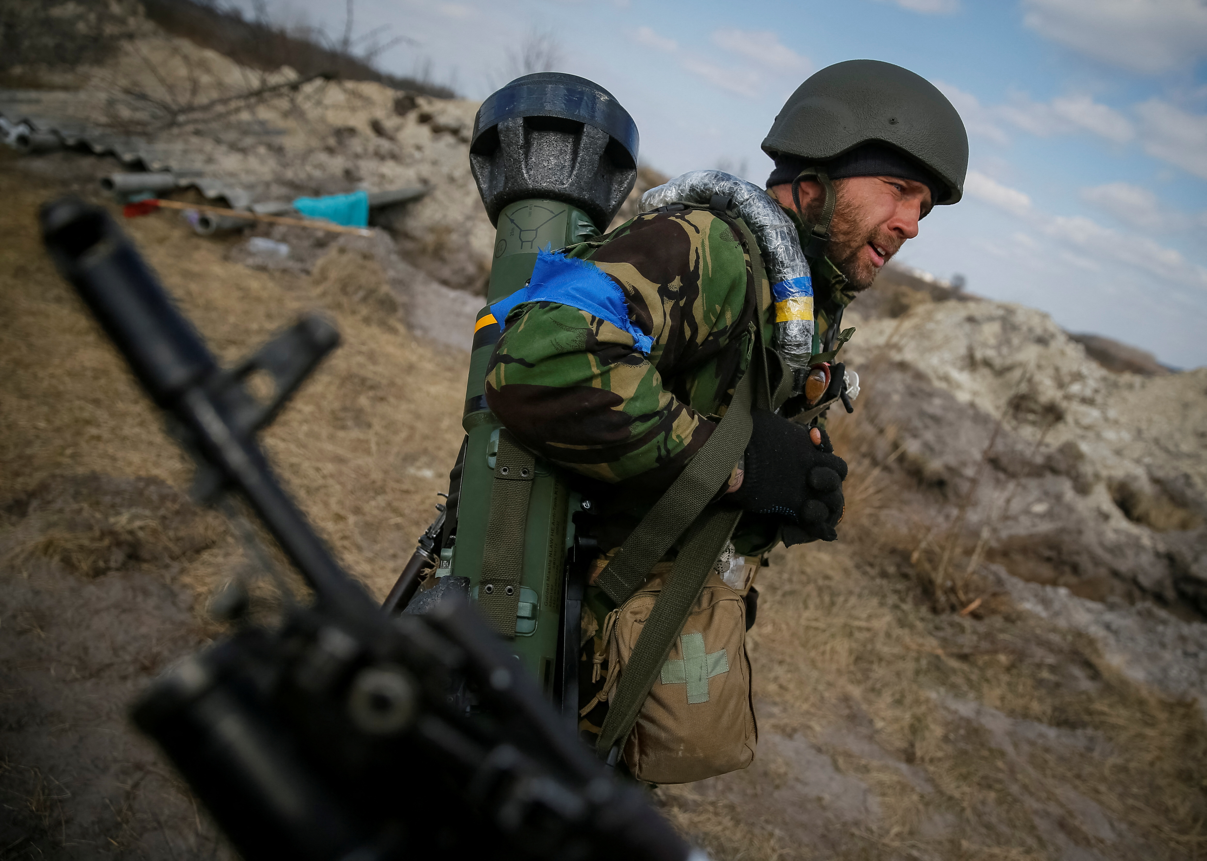 A Ukrainian service member holds a next generation light anti-tank weapon