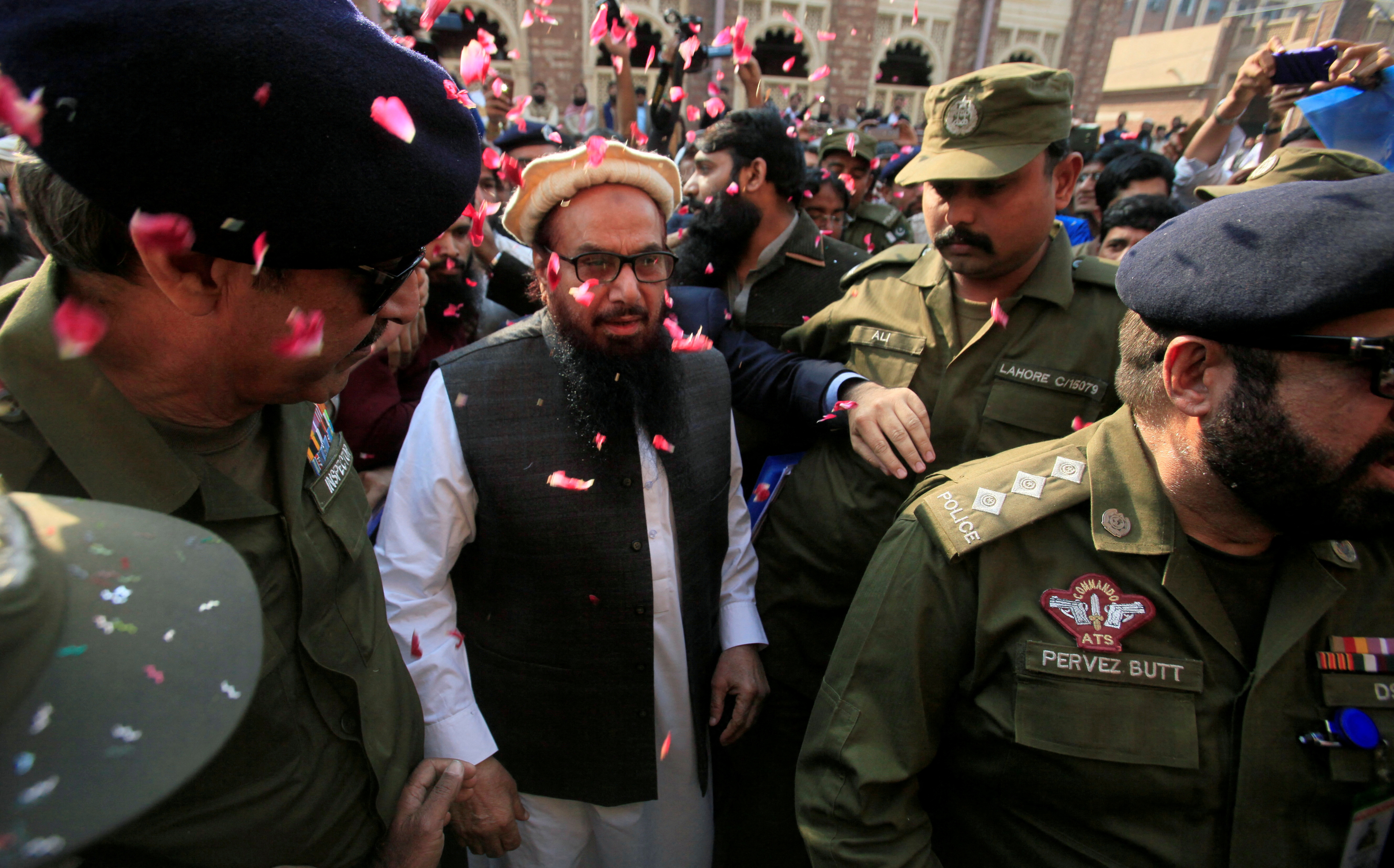 Hafiz Saeed walks to court in 2017.