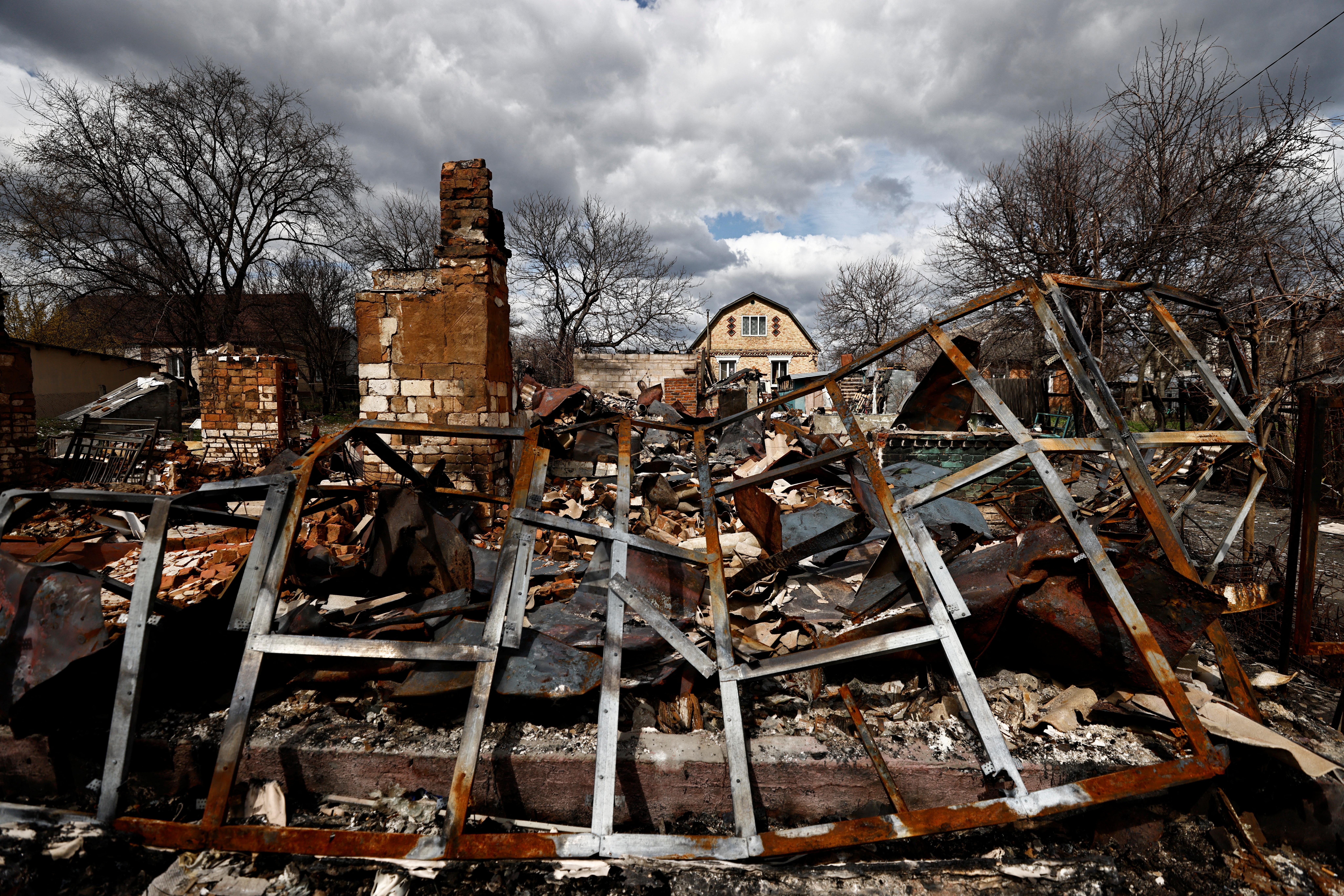 The remnants of a house destroyed by Russian shelling