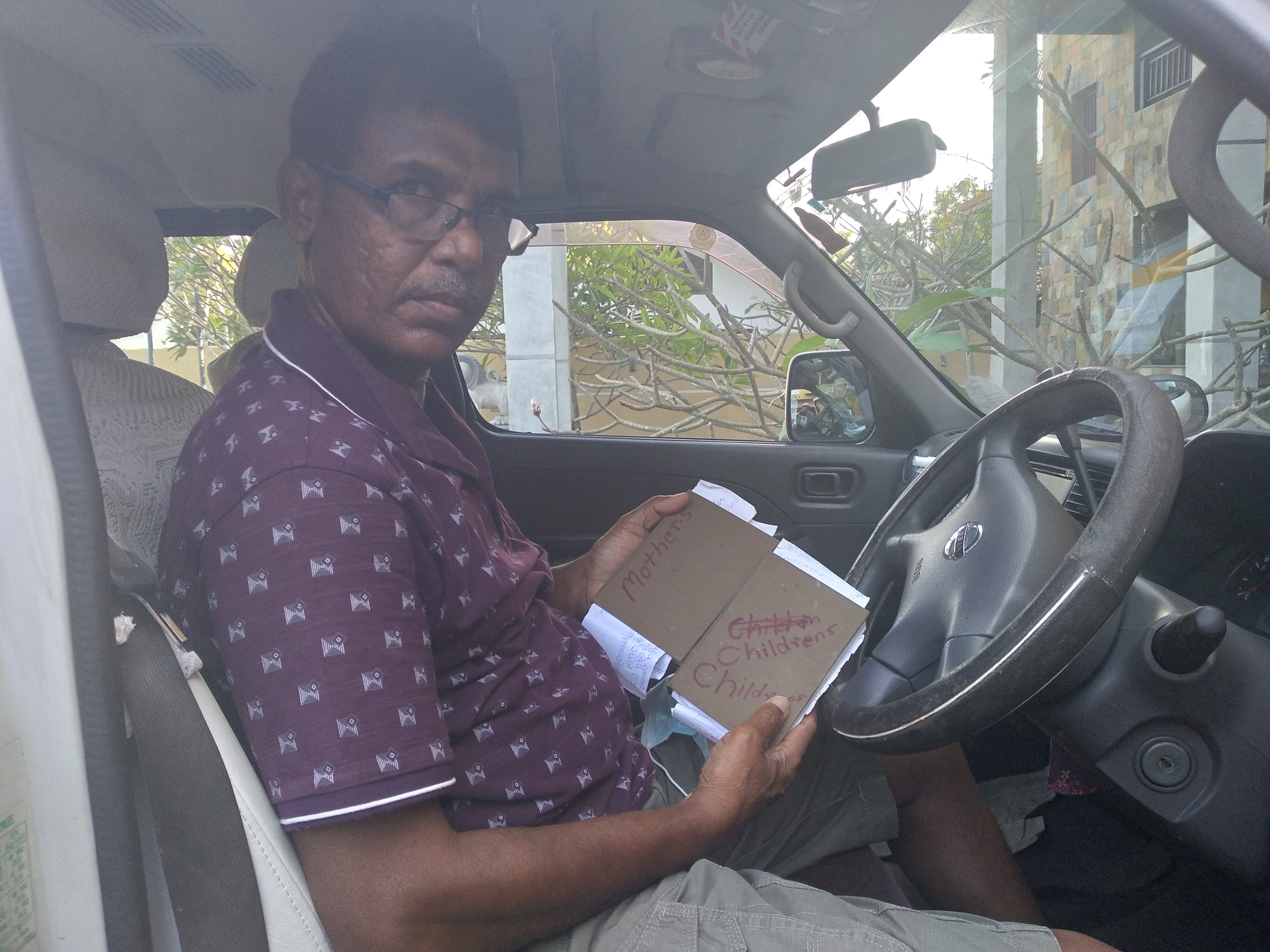 A man in a vehicle