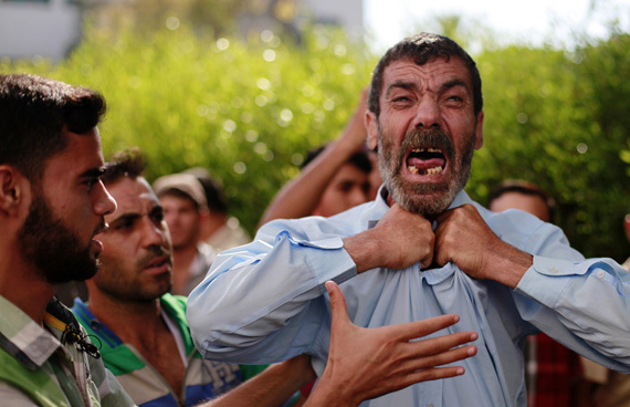 A man screaming as he learnt about the death of his child. 