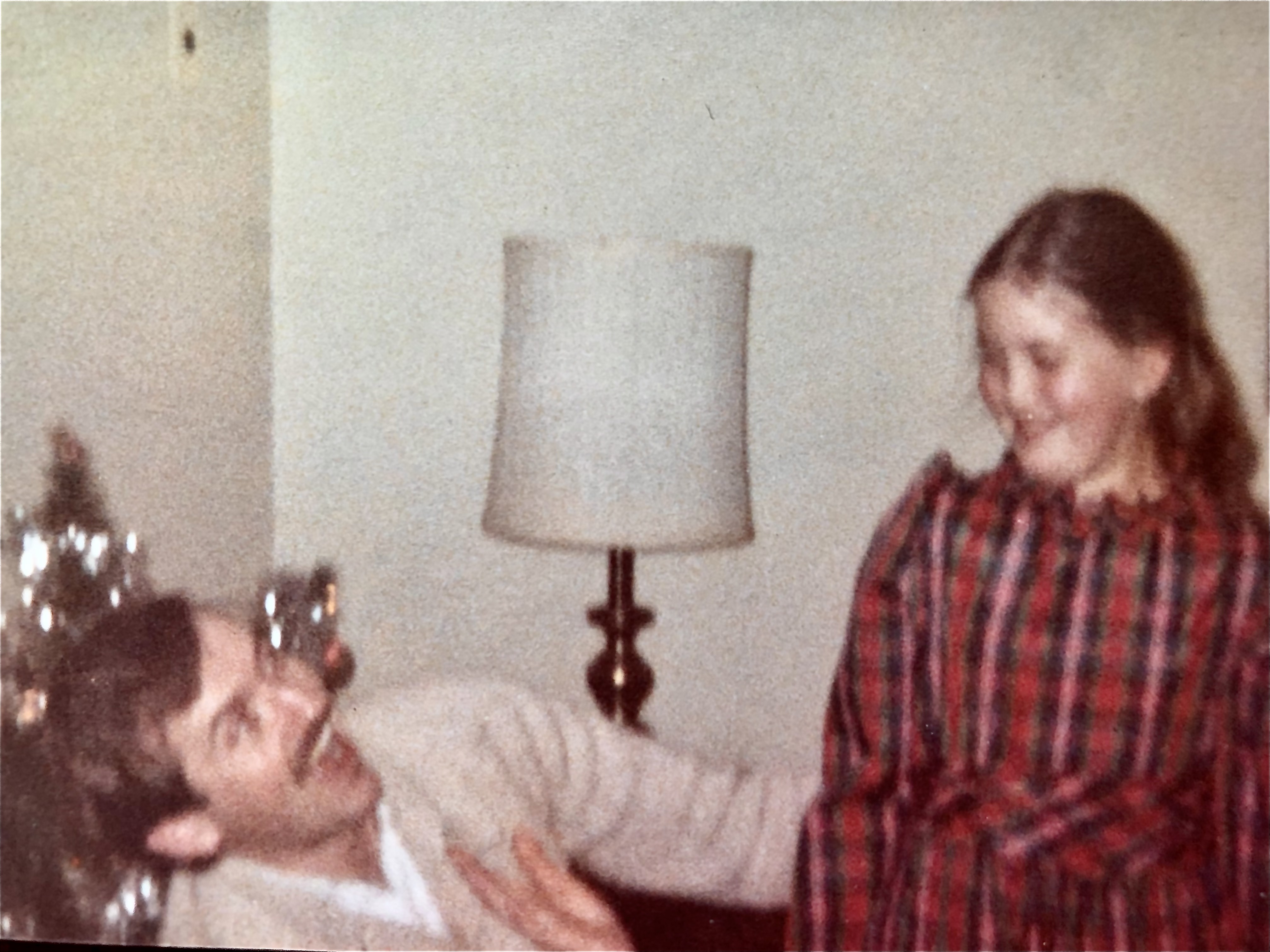 A girl with her uncle at Christmas in 1980
