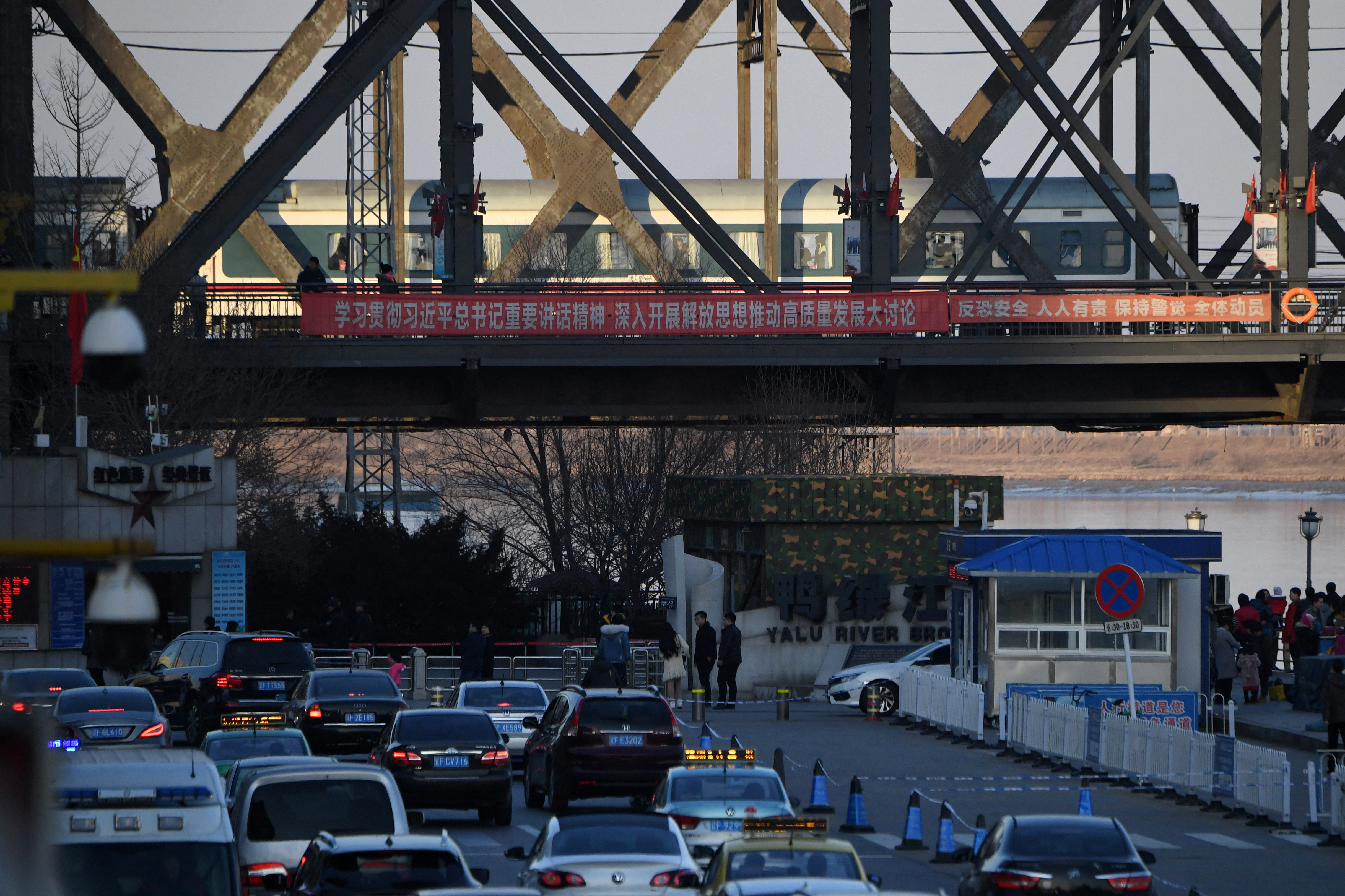 A train crosses the viaduct from North Korea into China at Dandong