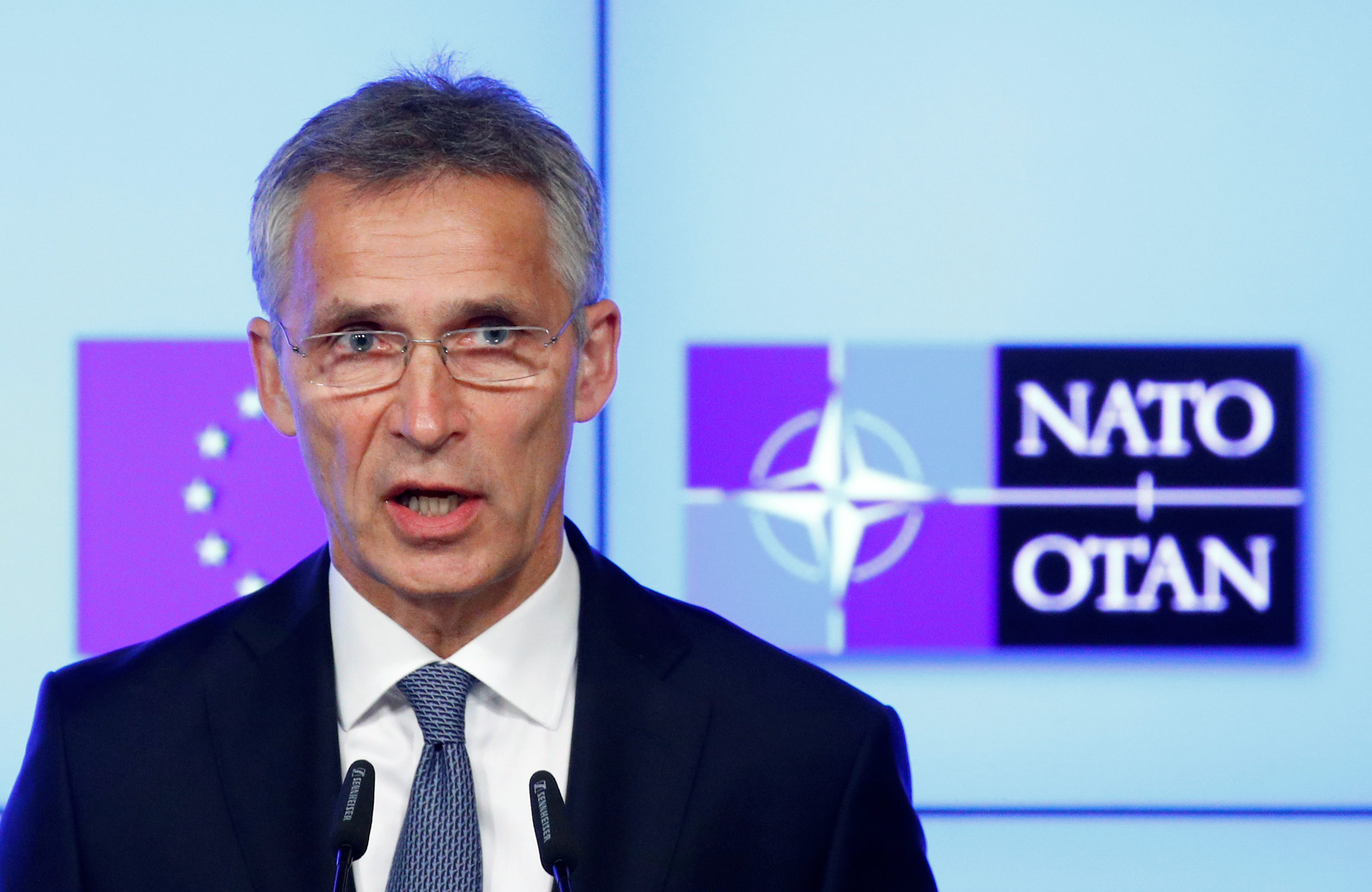 NATO Secretary General Jens Stoltenberg speaks next to European Council President Donald Tusk.