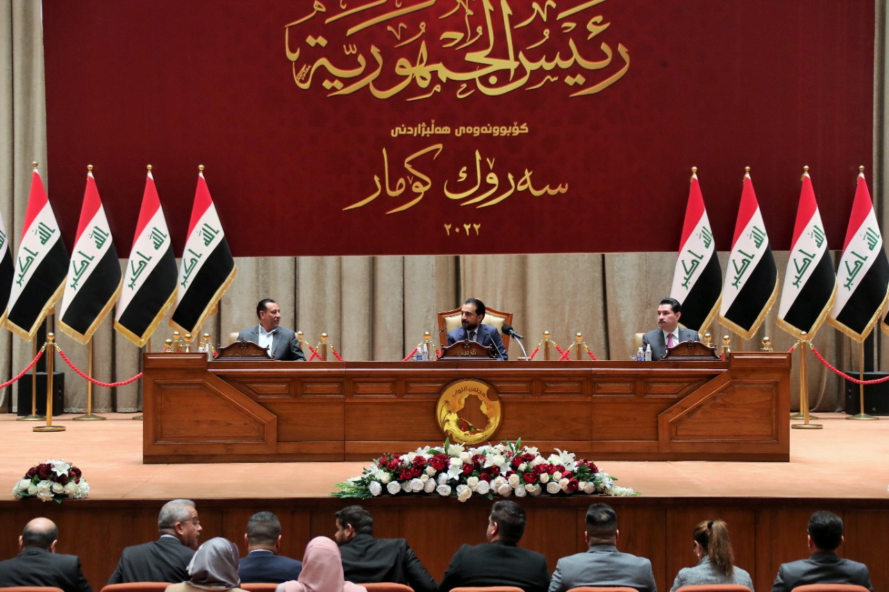Iraqi speaker of parliament Mohammed al-Halbousi sitting at the speaker's chair in the Iraqi parliament.