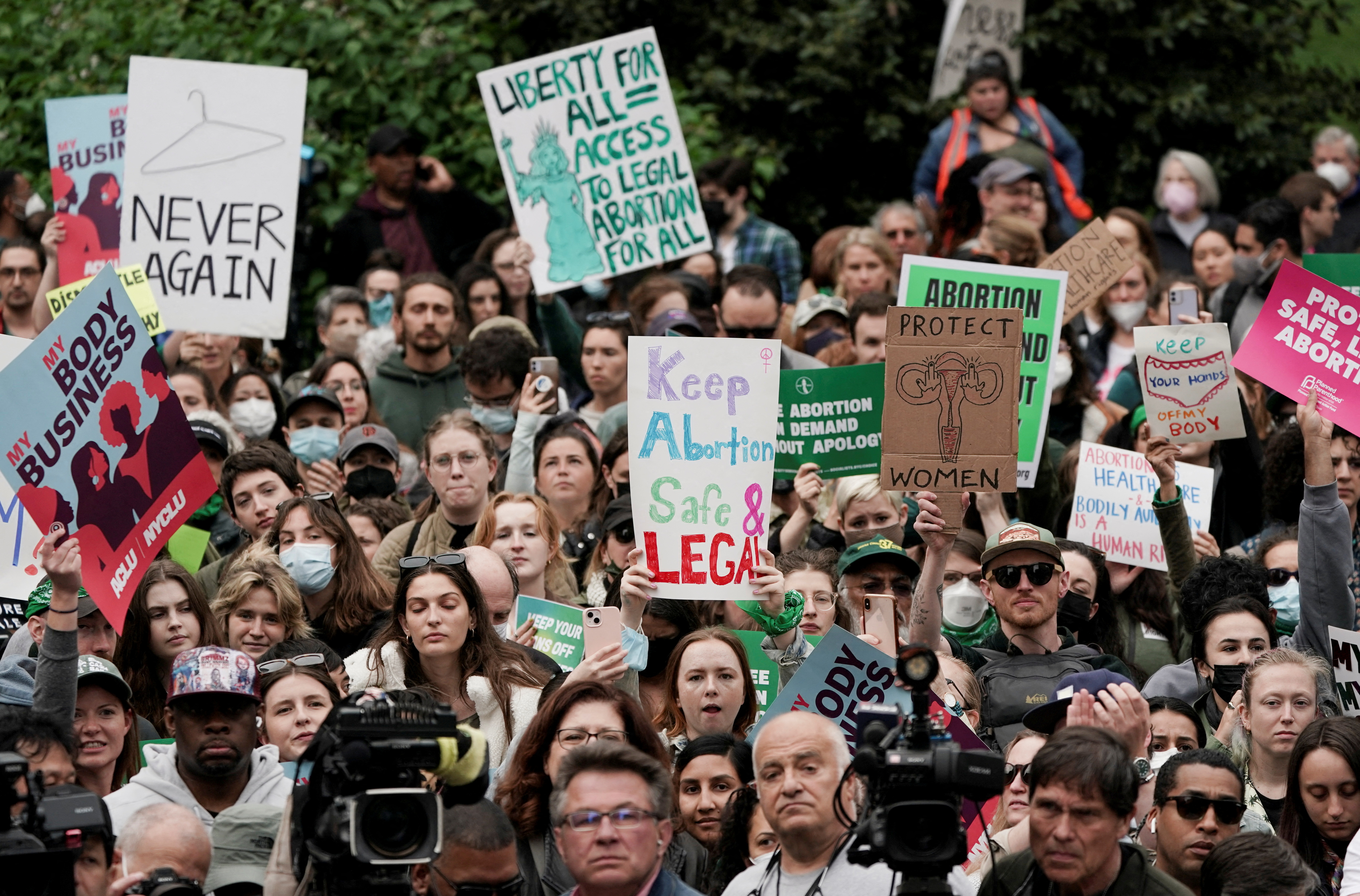 People participate in a protest in Foley Square, New York City.
