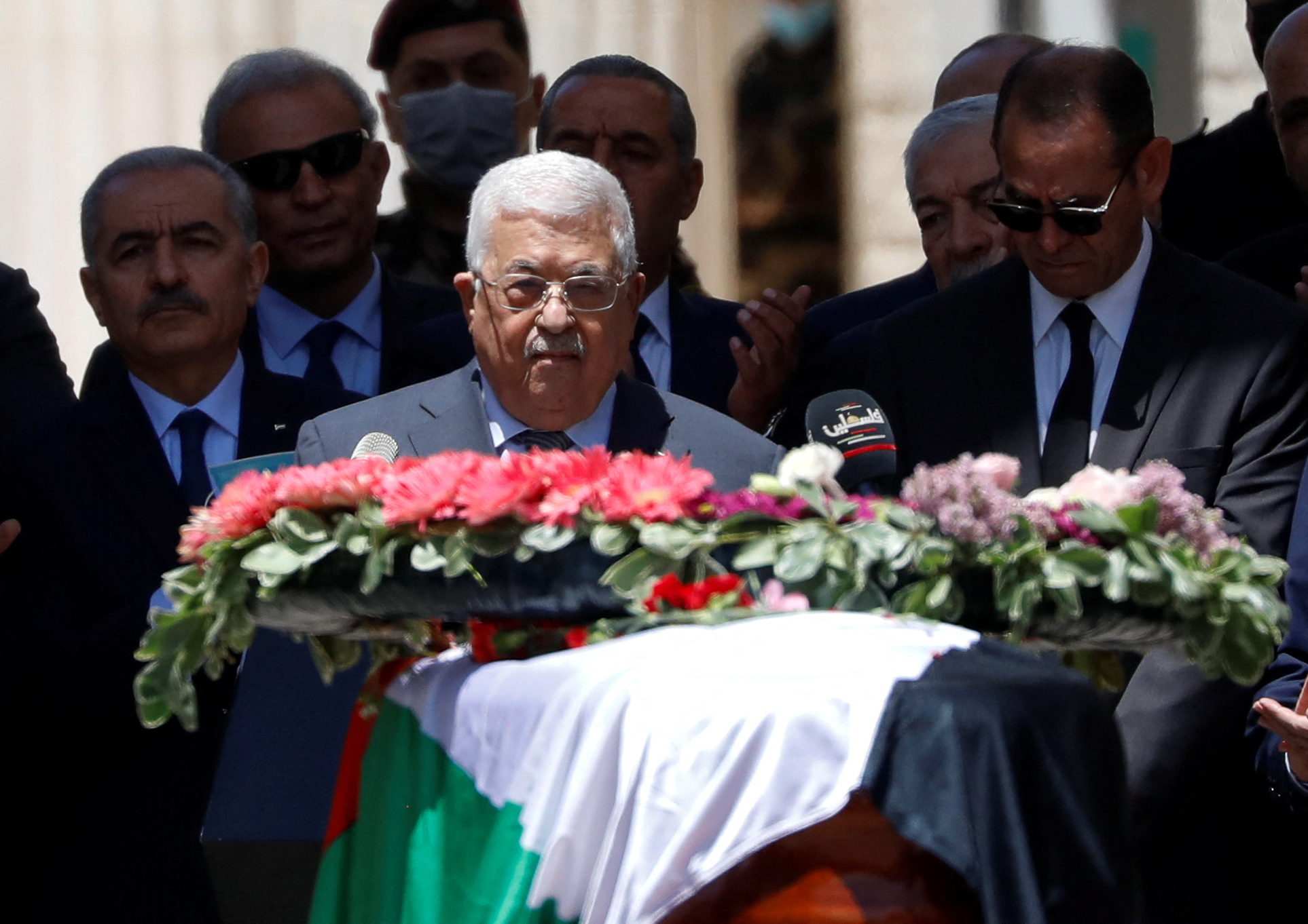 Palestinians attend a state service for veteran Al-Jazeera journalist Shireen Abu Akleh