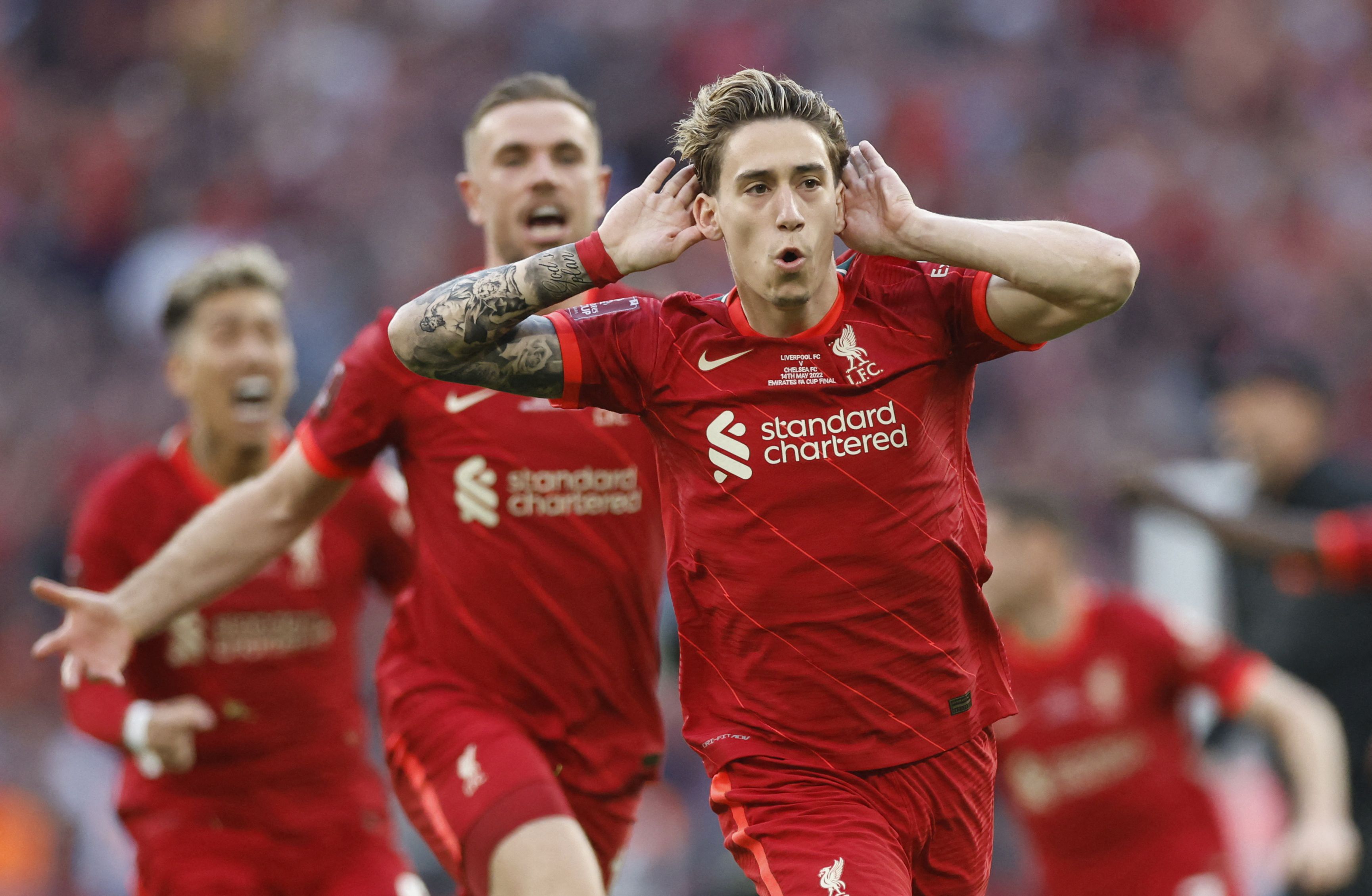 Kostas Tsimikas scoring the winning spot-kick