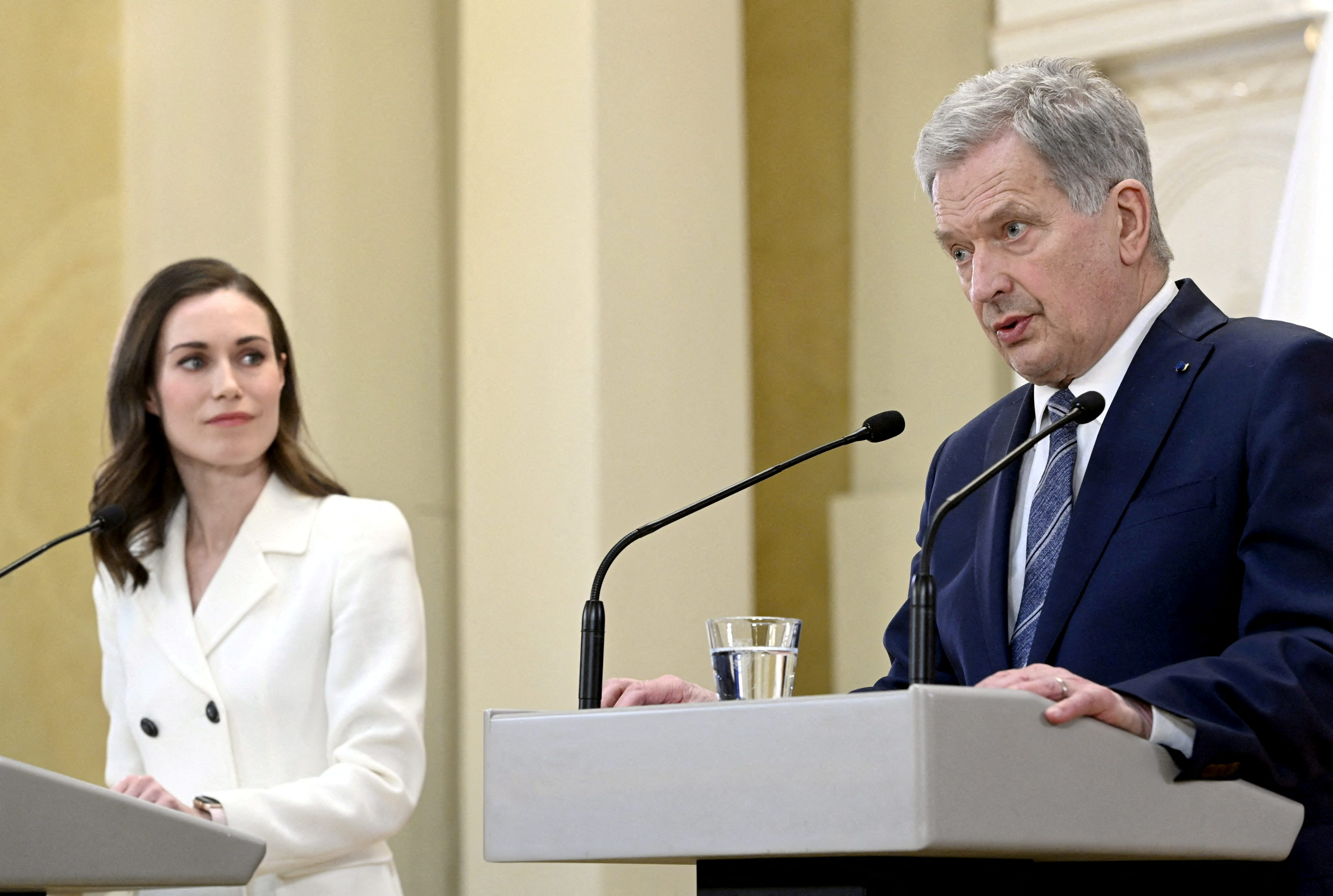 Finland's Prime Minister Sanna Marin and Finland's President Sauli Niinisto attend a joint news conference on Finland's security policy decisions at the Presidential Palace in Helsinki, Finland, May 15, 2022.