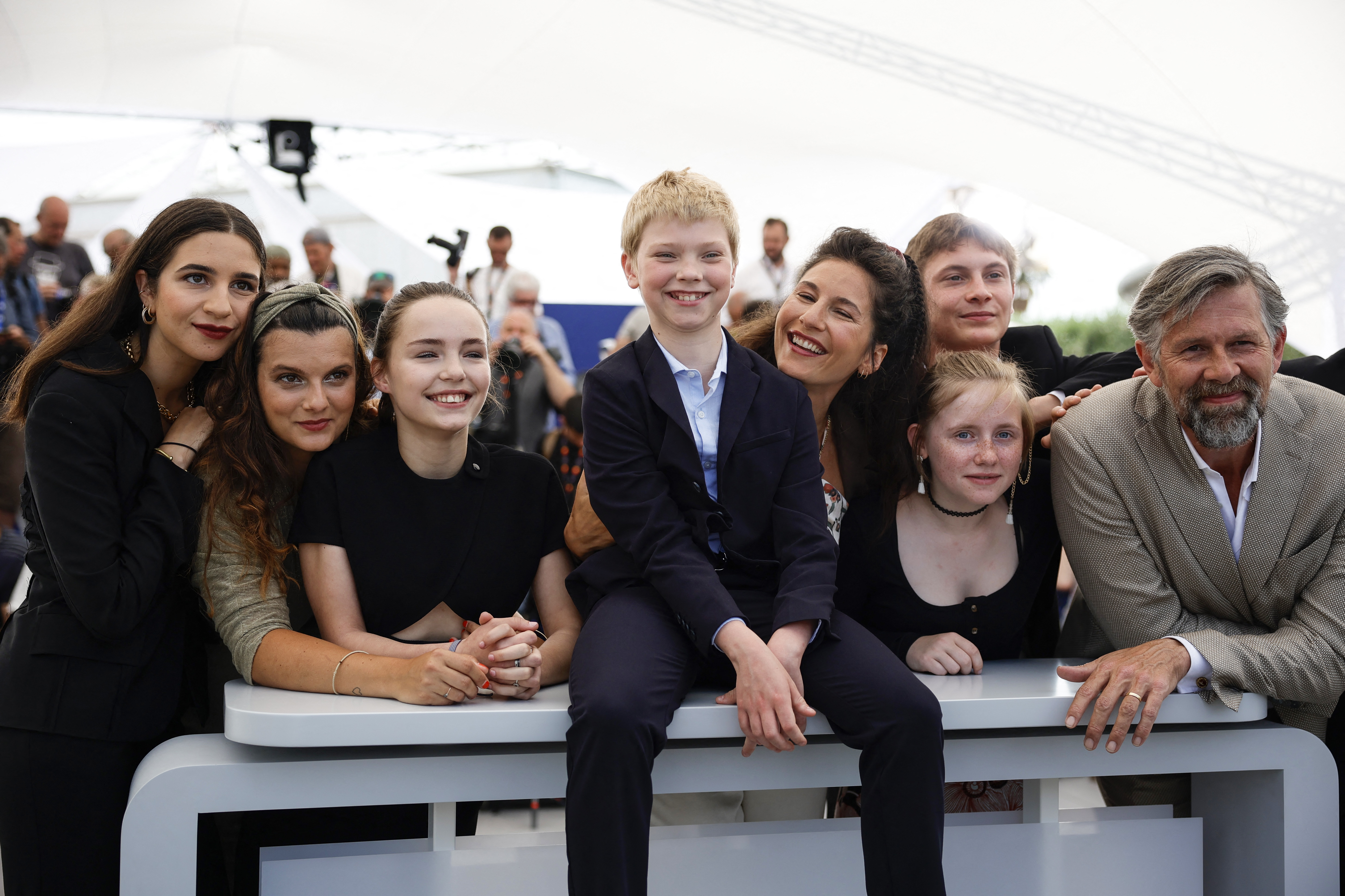Directors and cast members of the French film The Worst Ones pose at Cannes Film Festival