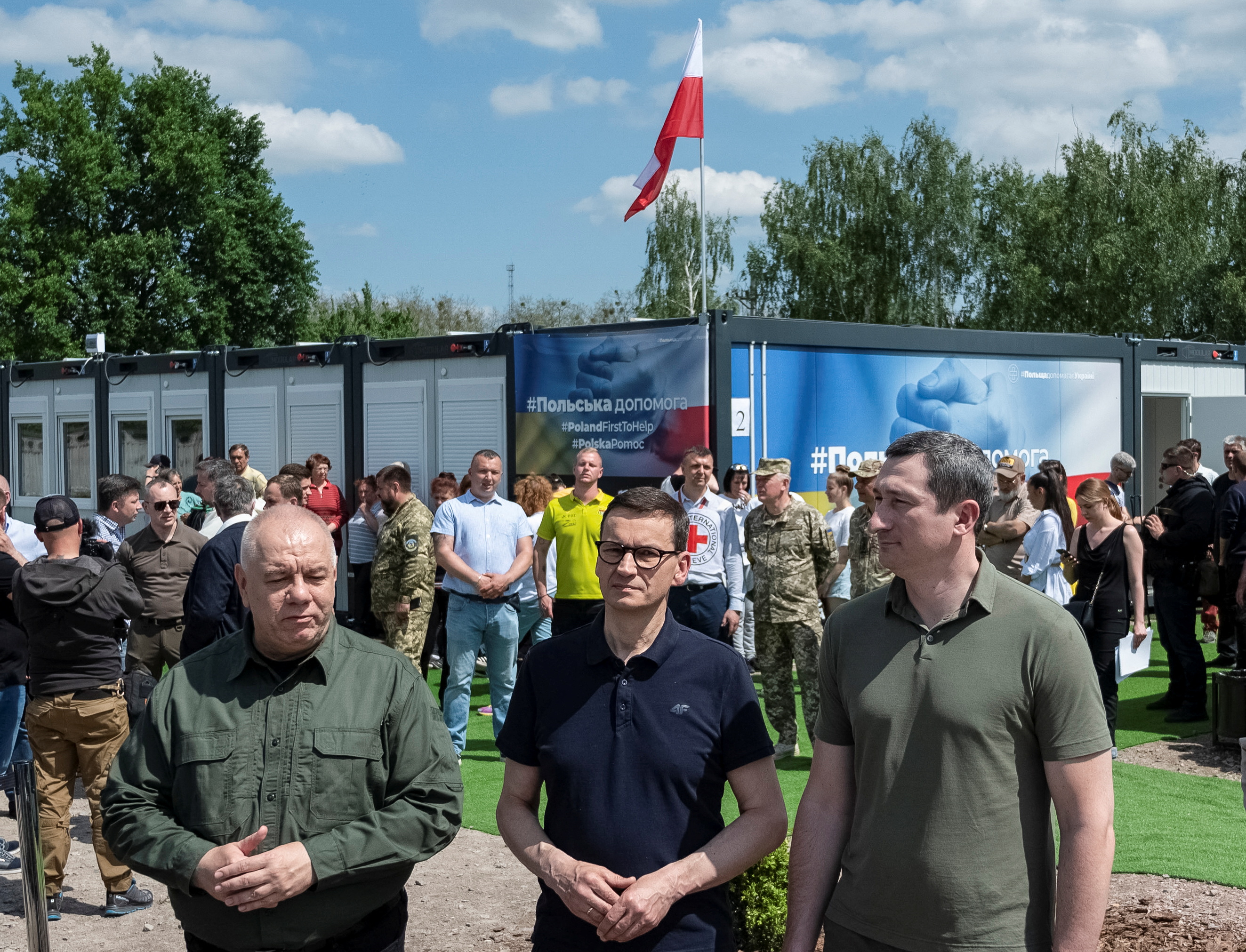 Polish Prime Minister Mateusz Morawiecki is seen attending the opening ceremony of a temporary shelter built with the help of Polish government for those who lost their apartments in the war, amid Russia's attack on Ukraine, in Borodianka