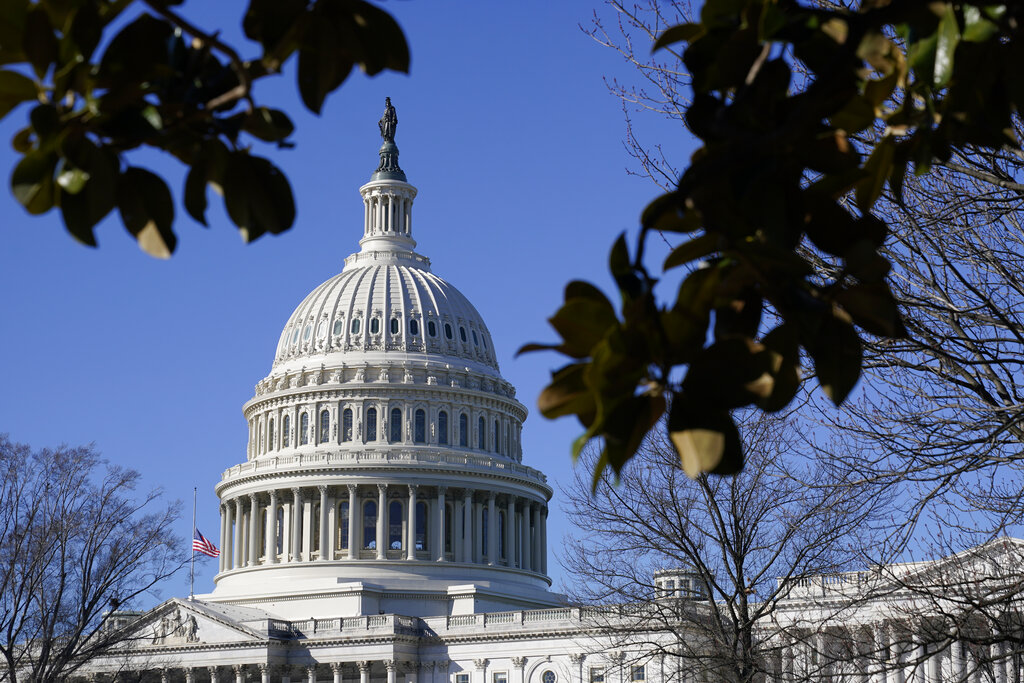 Sunlight shines on the U.S. Capitol dome on Capitol Hill in Washington.