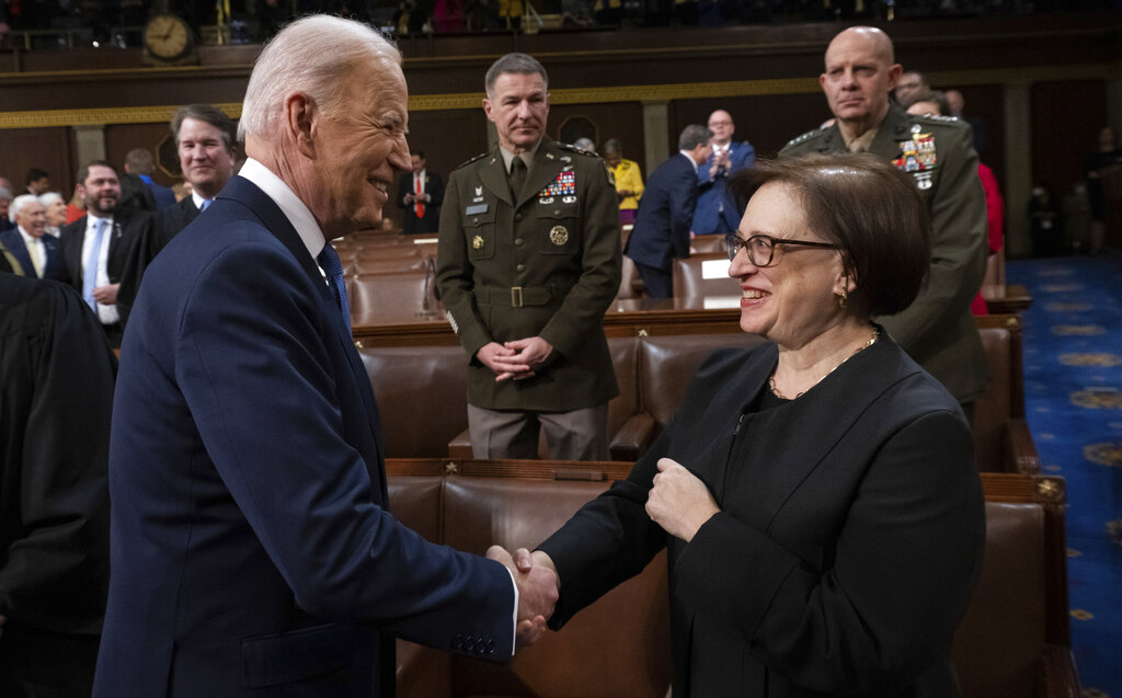 Biden shakes hands with Court Associate Justice Elena Kagan