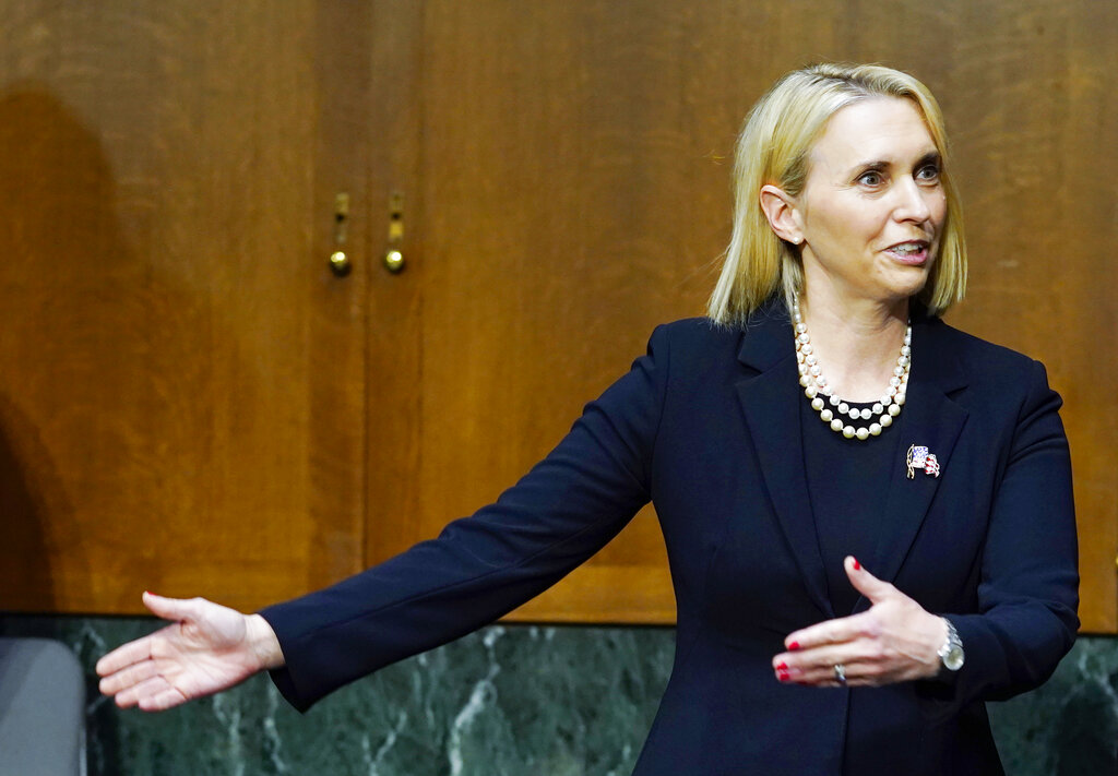 Bridget Brink, nominated to be U.S Ambassador to Ukraine, talks before she testifies before a Senate Foreign Relations Committee confirmation hearing.