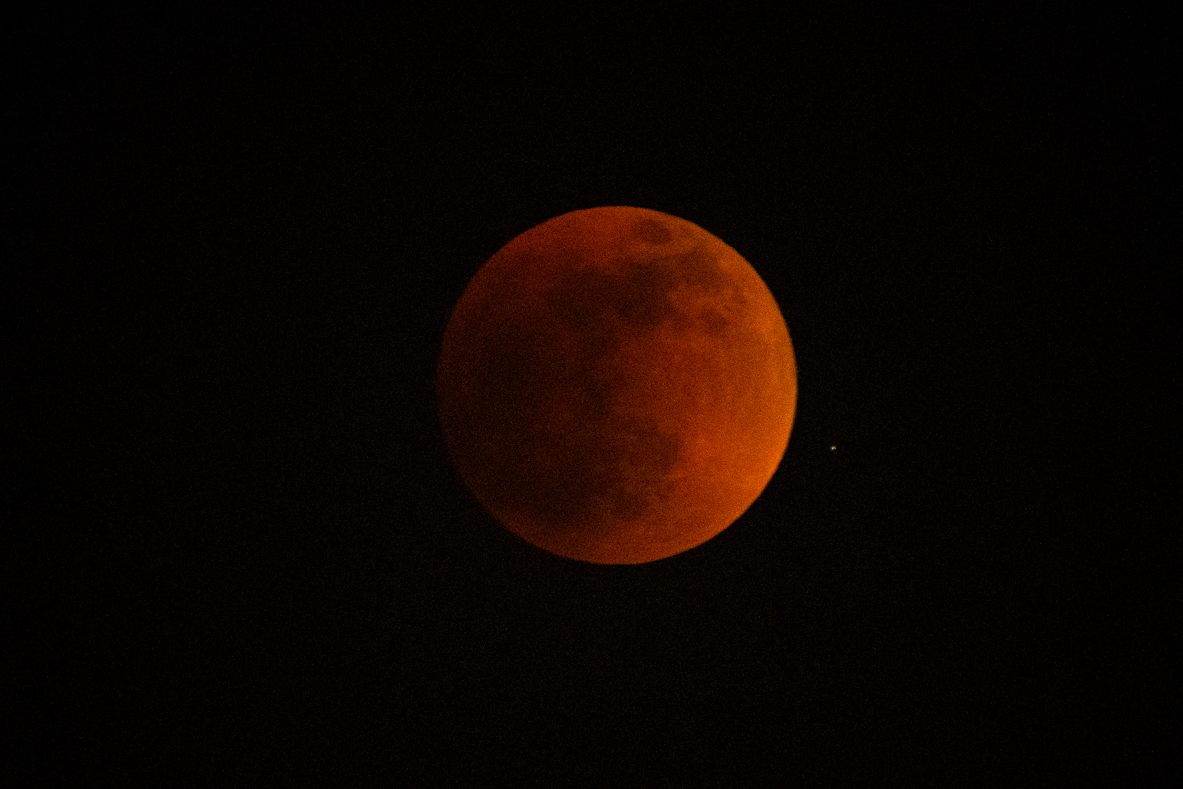 A total lunar eclipse is seen during the first blood moon of the year, in Temple City, Calif.