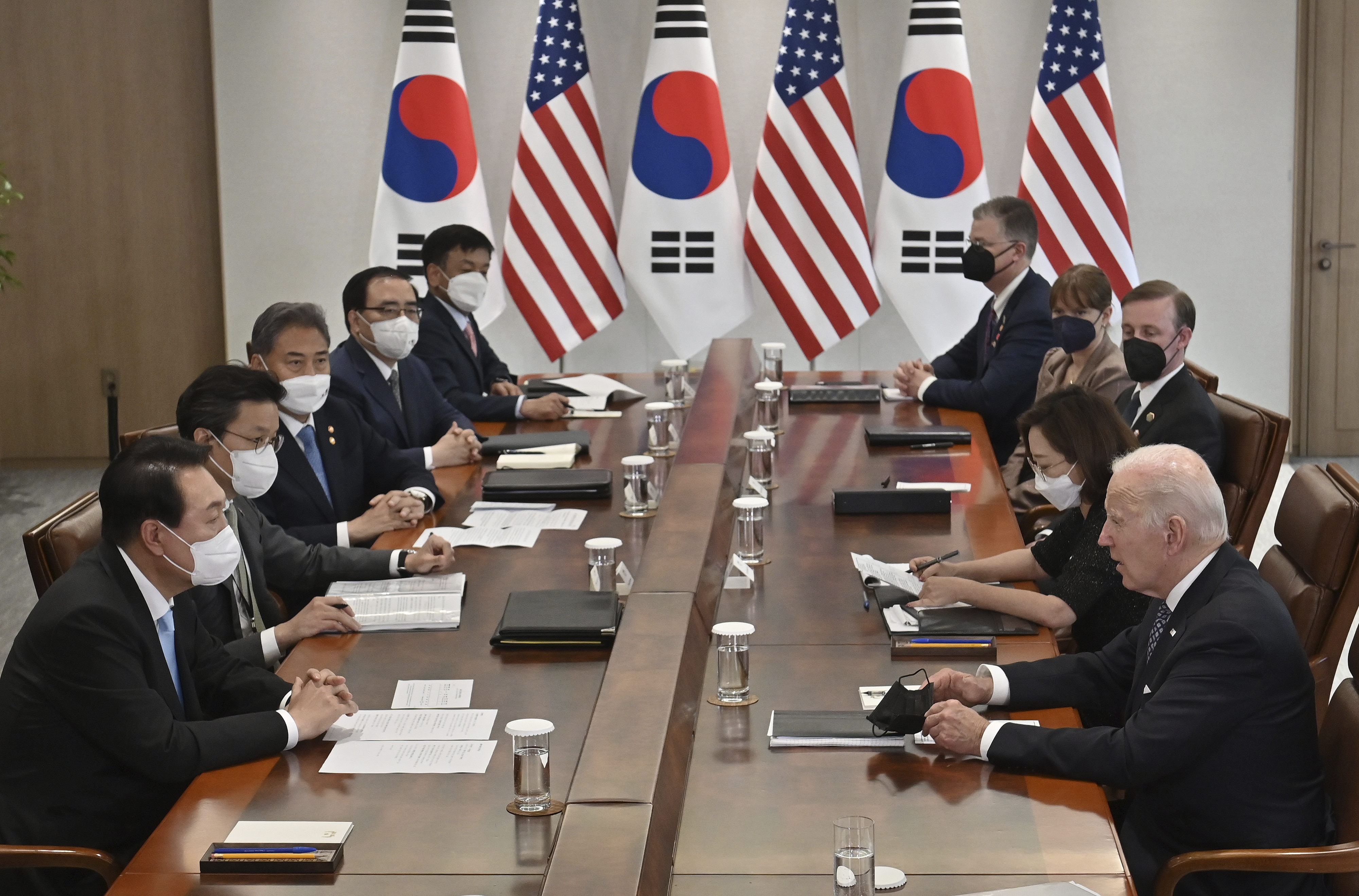 US President Joe Biden, right, talks with South Korean President Yoon Suk-yeol, left, during their meeting at the People’s House in Seoul on Saturday, May 21, 2022