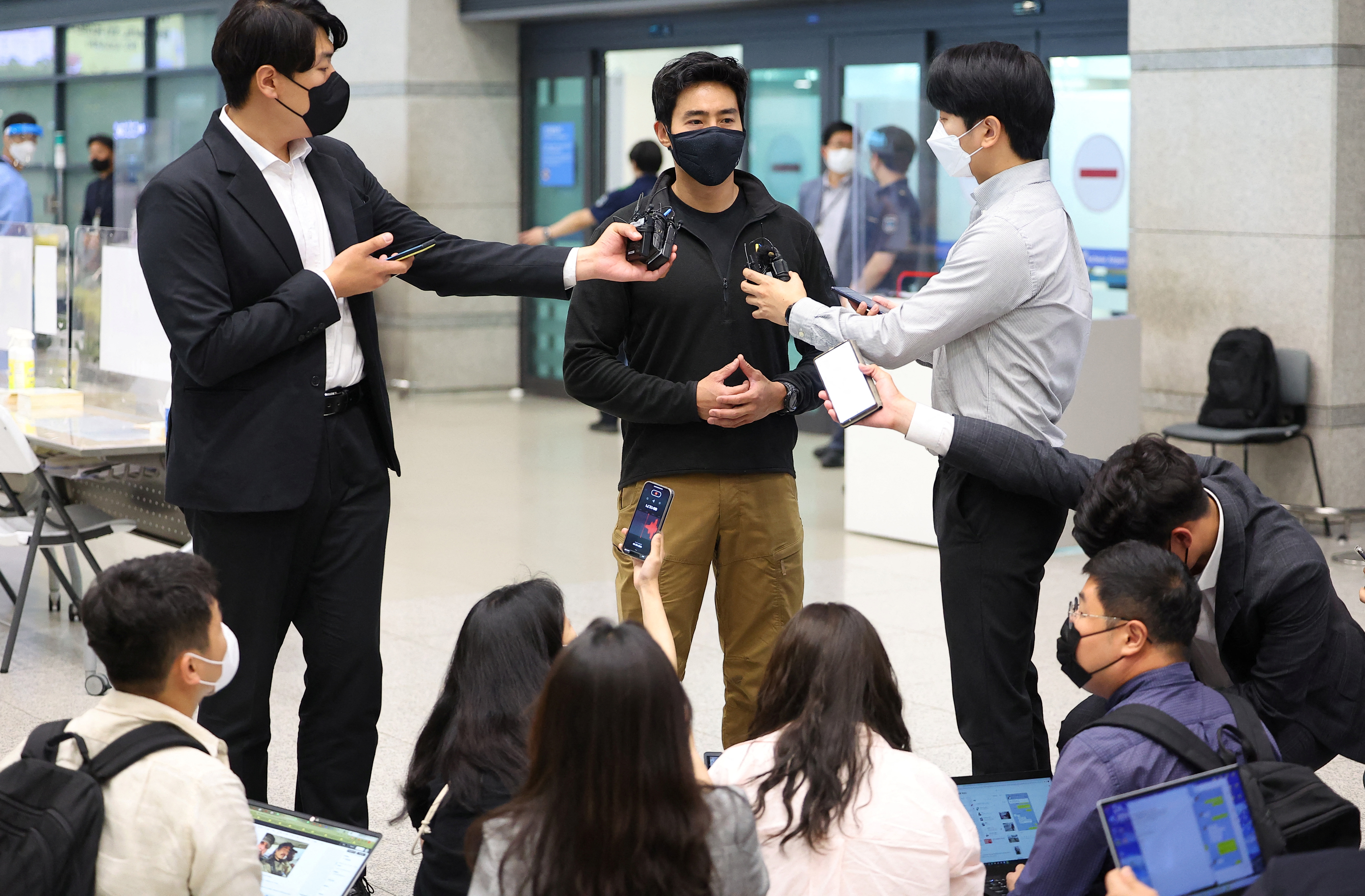 Rhee Keun, a former member of South Korean naval special forces who is also known as Ken Rhee, speaks to the media upon his arrival at Incheon international airport