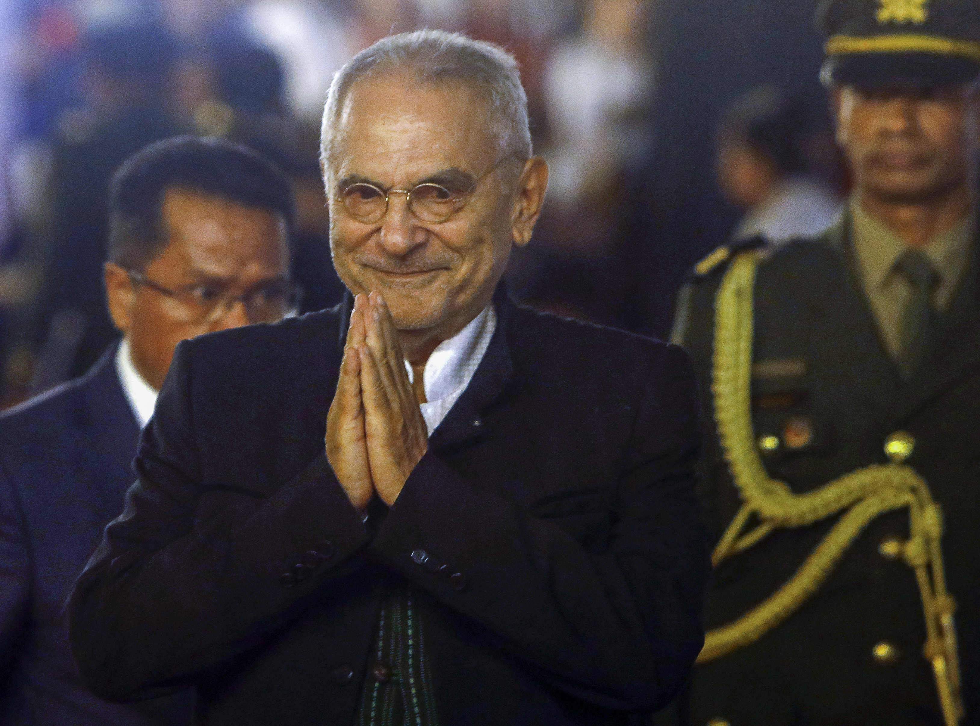 Timor Leste's President Jose Ramos Horta puts his hands together to acknowledge the crowd at his inauguration
