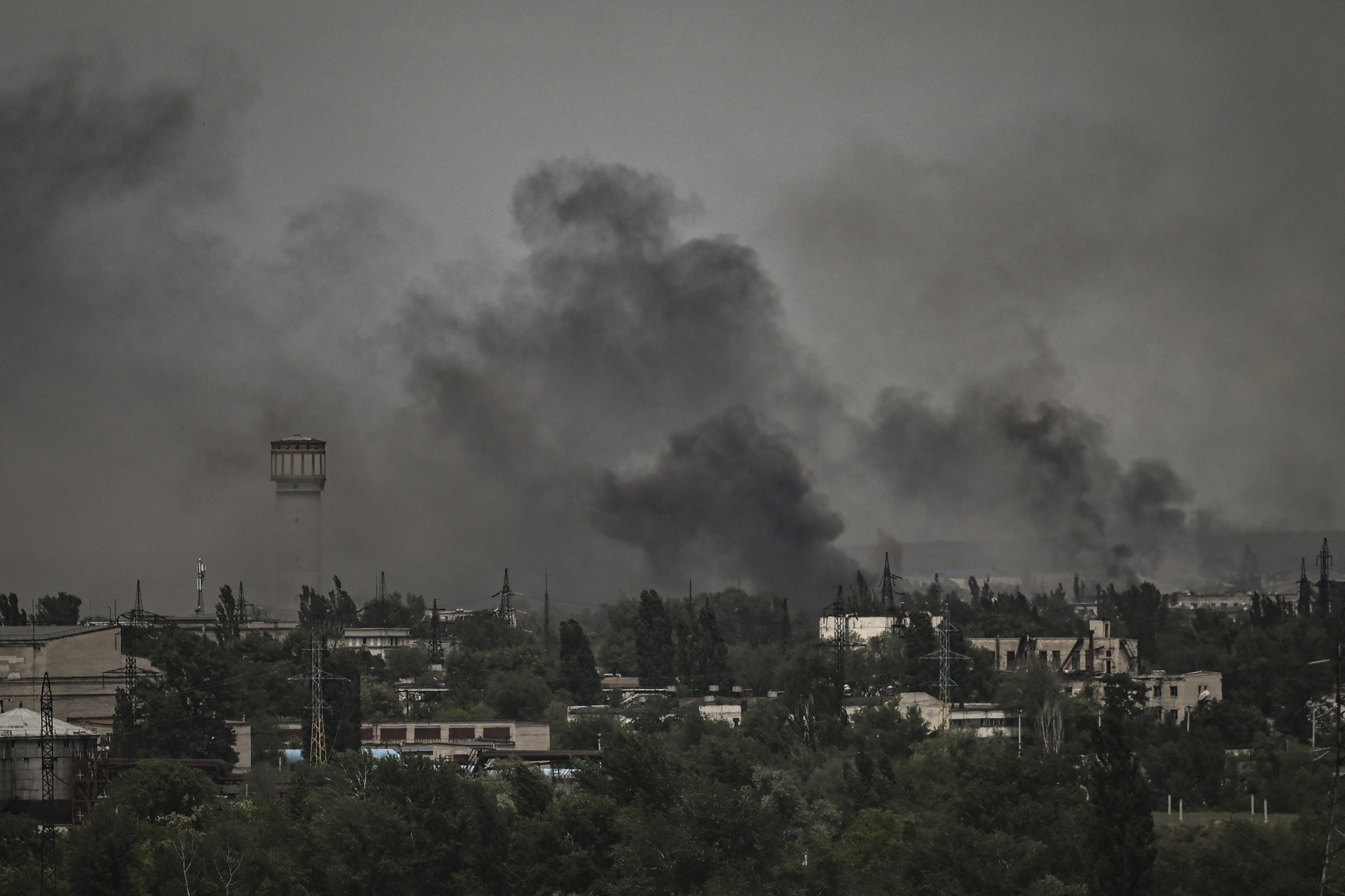 Smoke and dirt rise in the city of Severodonetsk 