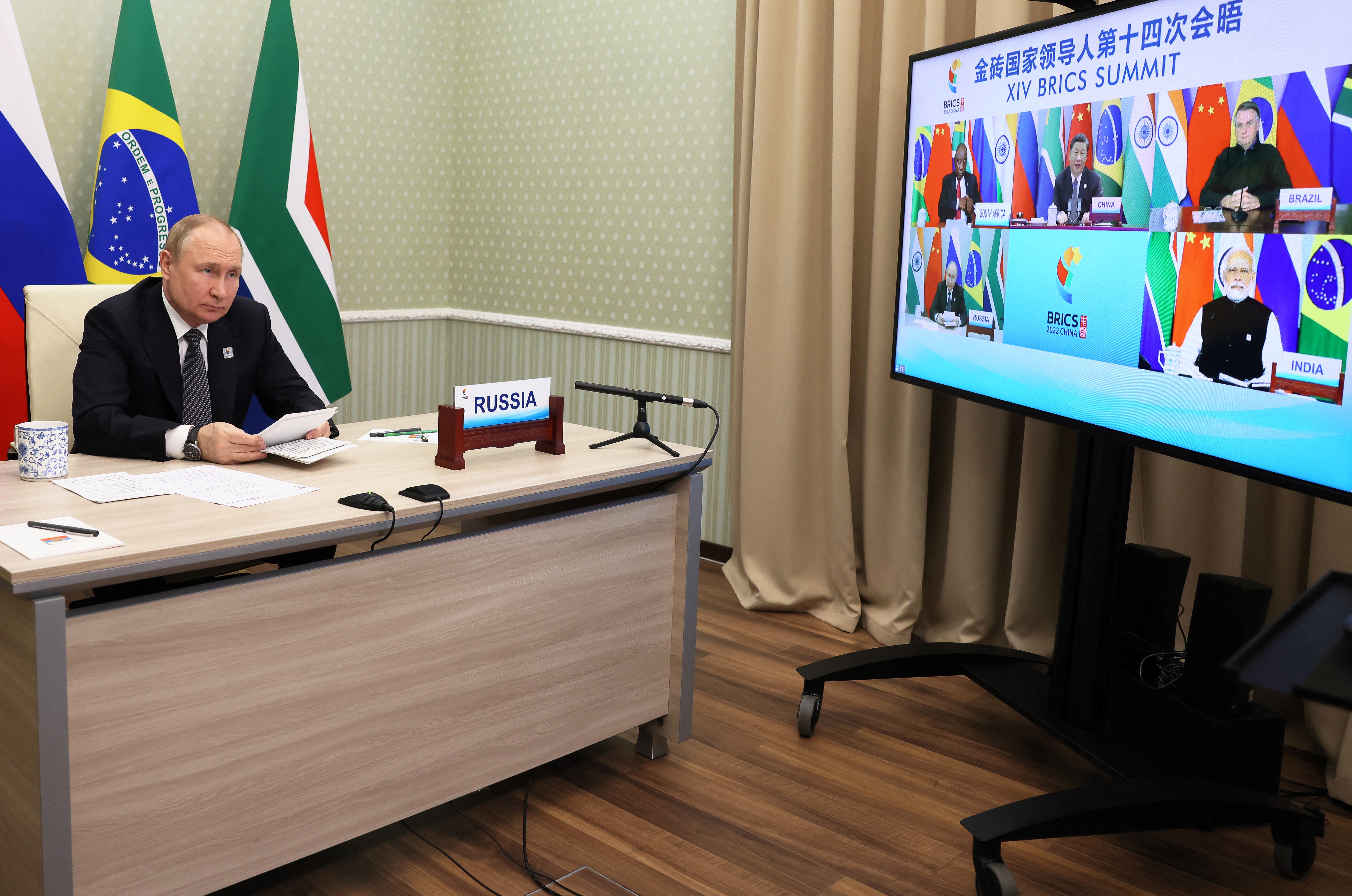 Russian President Vladimir Putin takes part in the XIV BRICS summit in virtual format