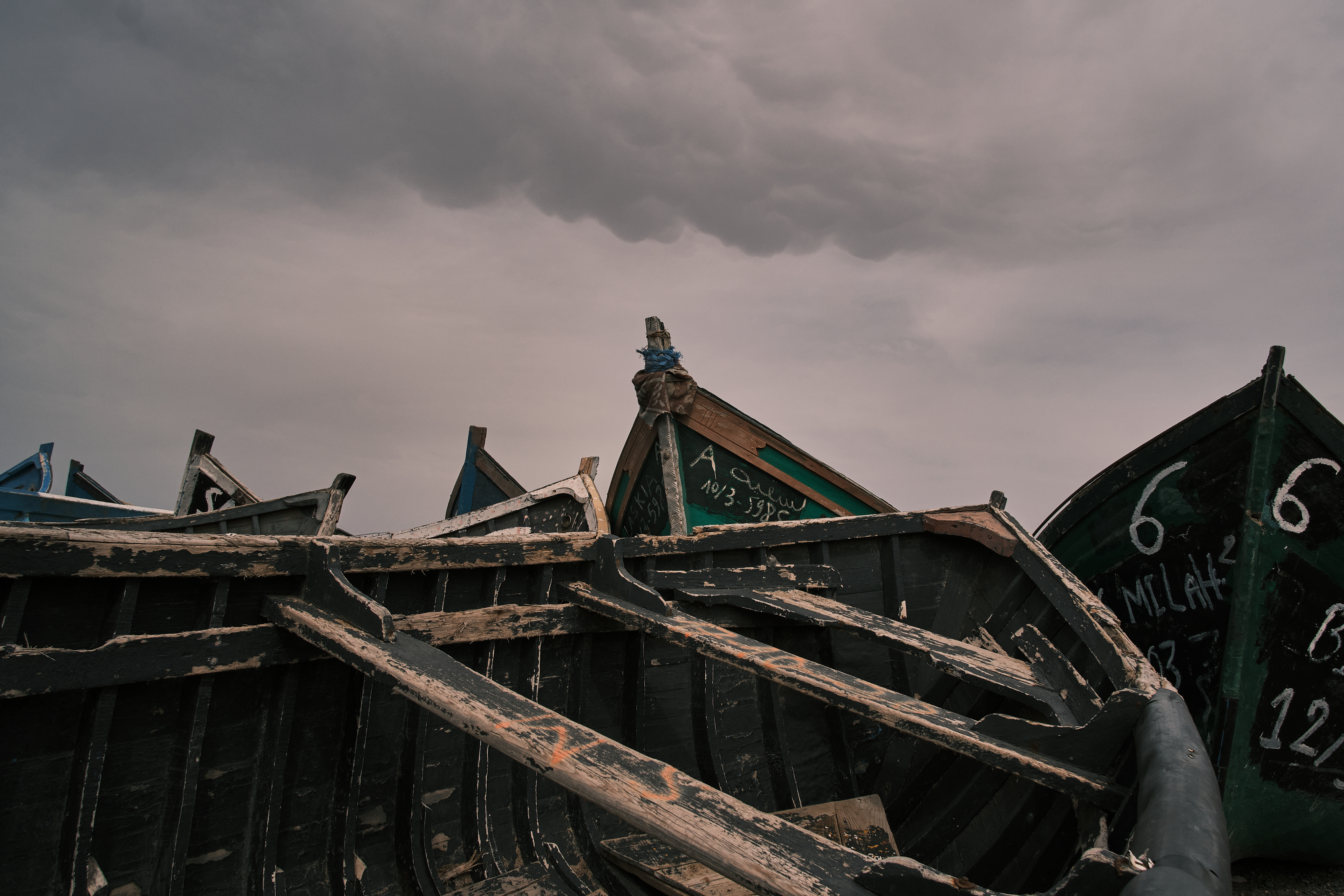 A photo of a graveyard of boats that came ashore in the port of Arinaga, Gran Canaria.