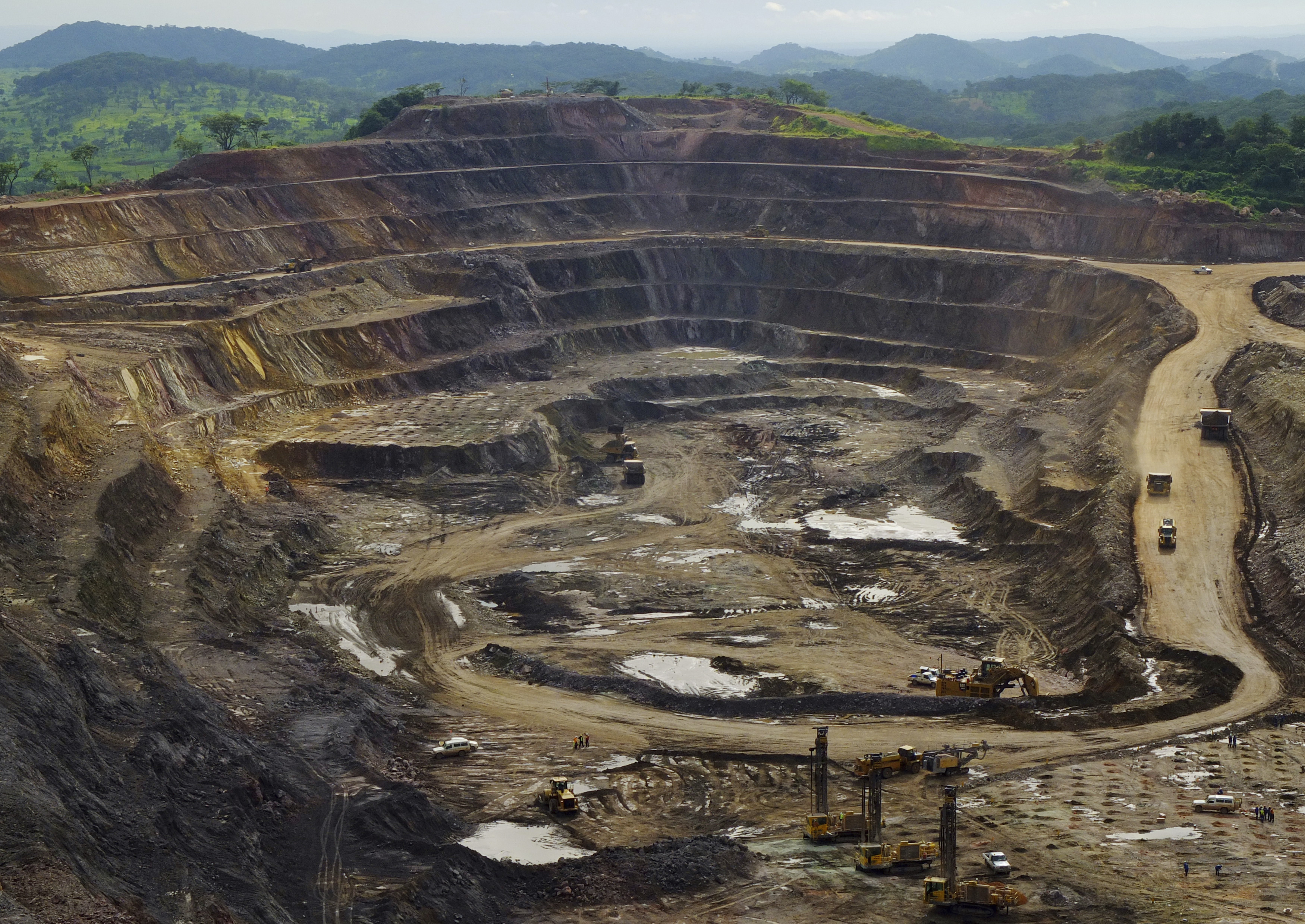 Excavators and drillers at work in an open pit at Tenke Fungurume, a copper and cobalt mine 110 km (68 miles) northwest of Lubumbashi in Congo's copper-producing south