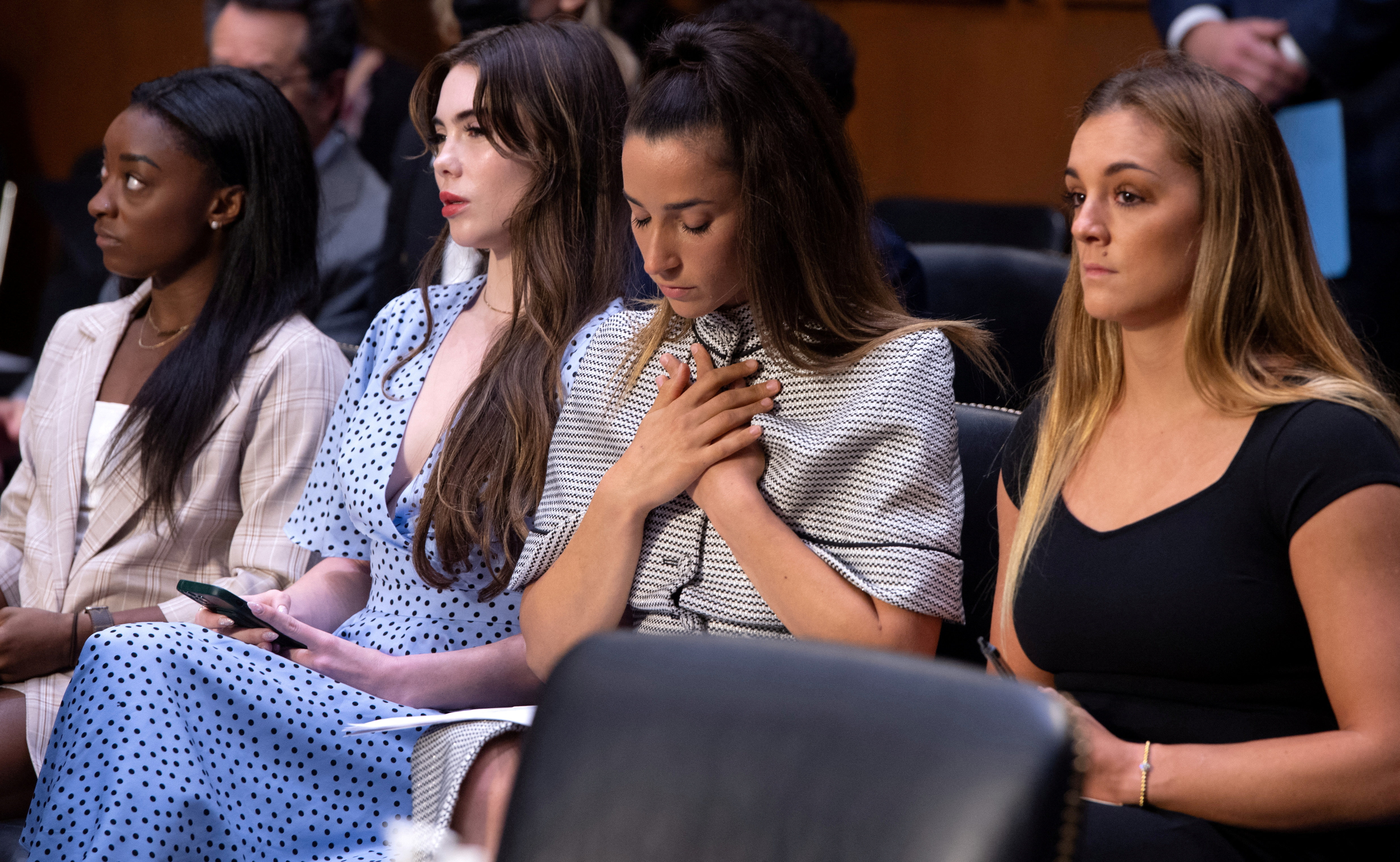 U.S. Olympic gymnasts Simone Biles, McKayla Maroney, Aly Raisman and Maggie Nichols arrive to testify during a Senate Judiciary hearing