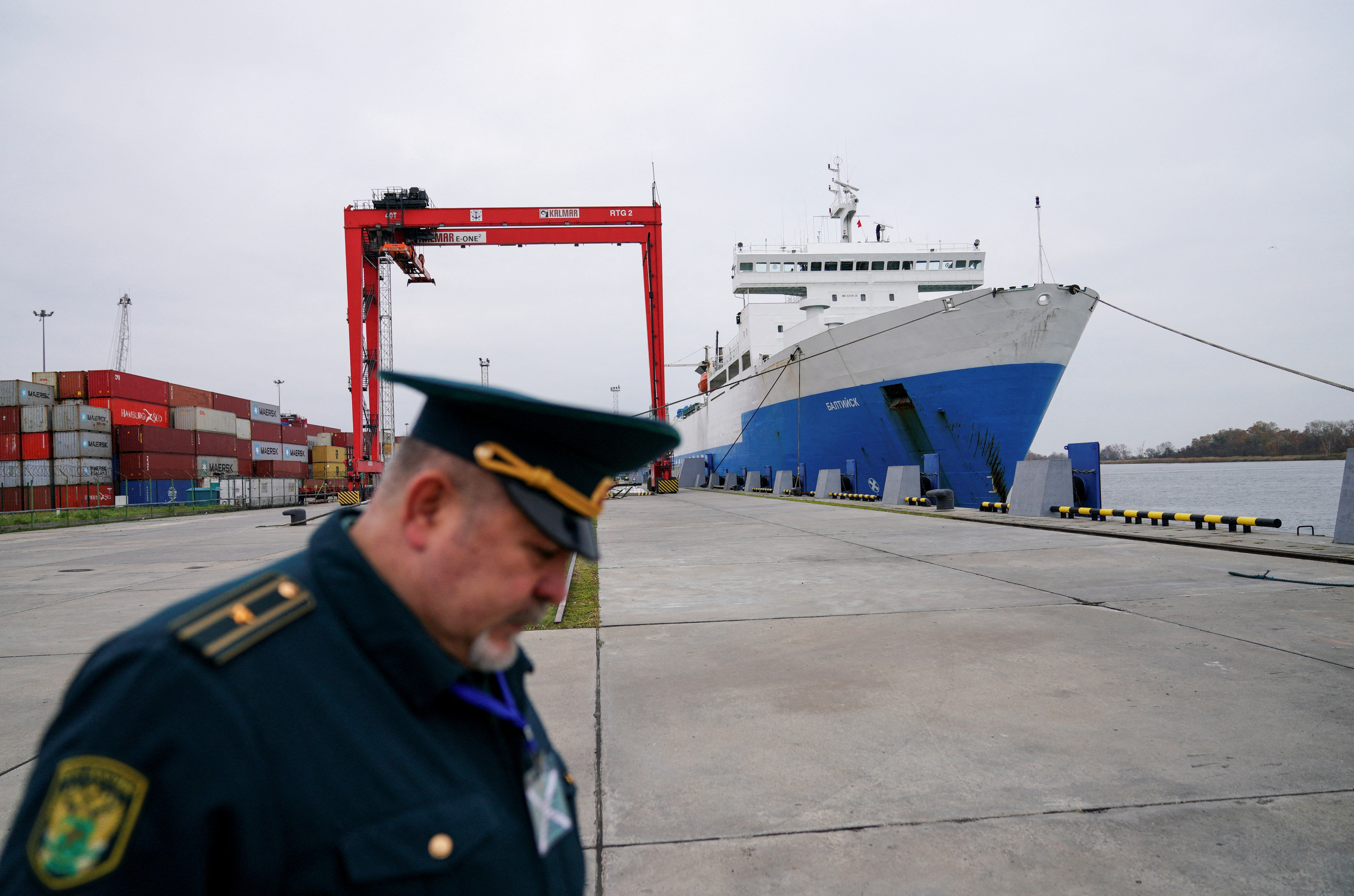 A Russian customs officer works at a commercial port in the Baltic Sea town of Baltiysk in the Kaliningrad region