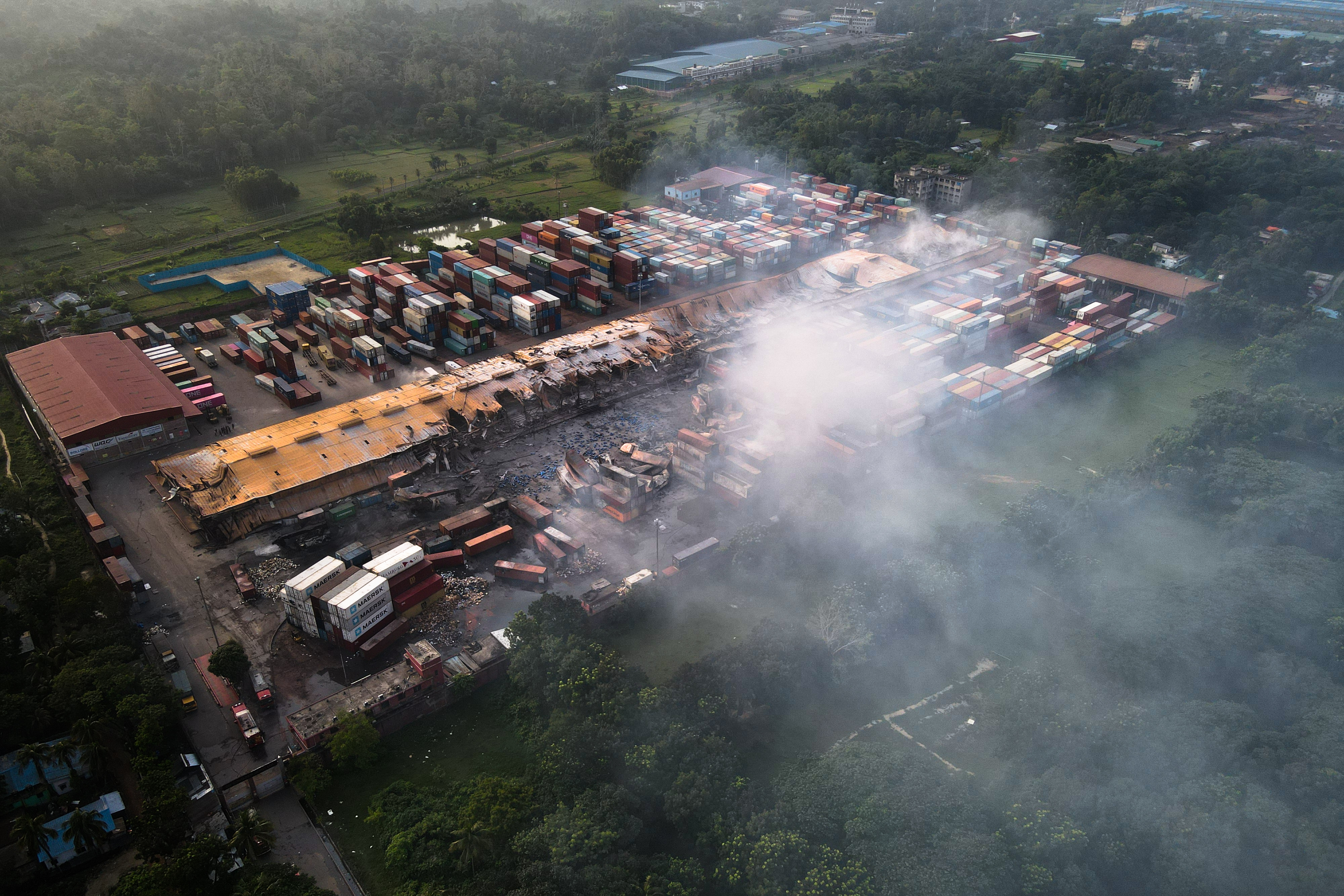 Smoke rises from containers at the BM Inland Container Depot,