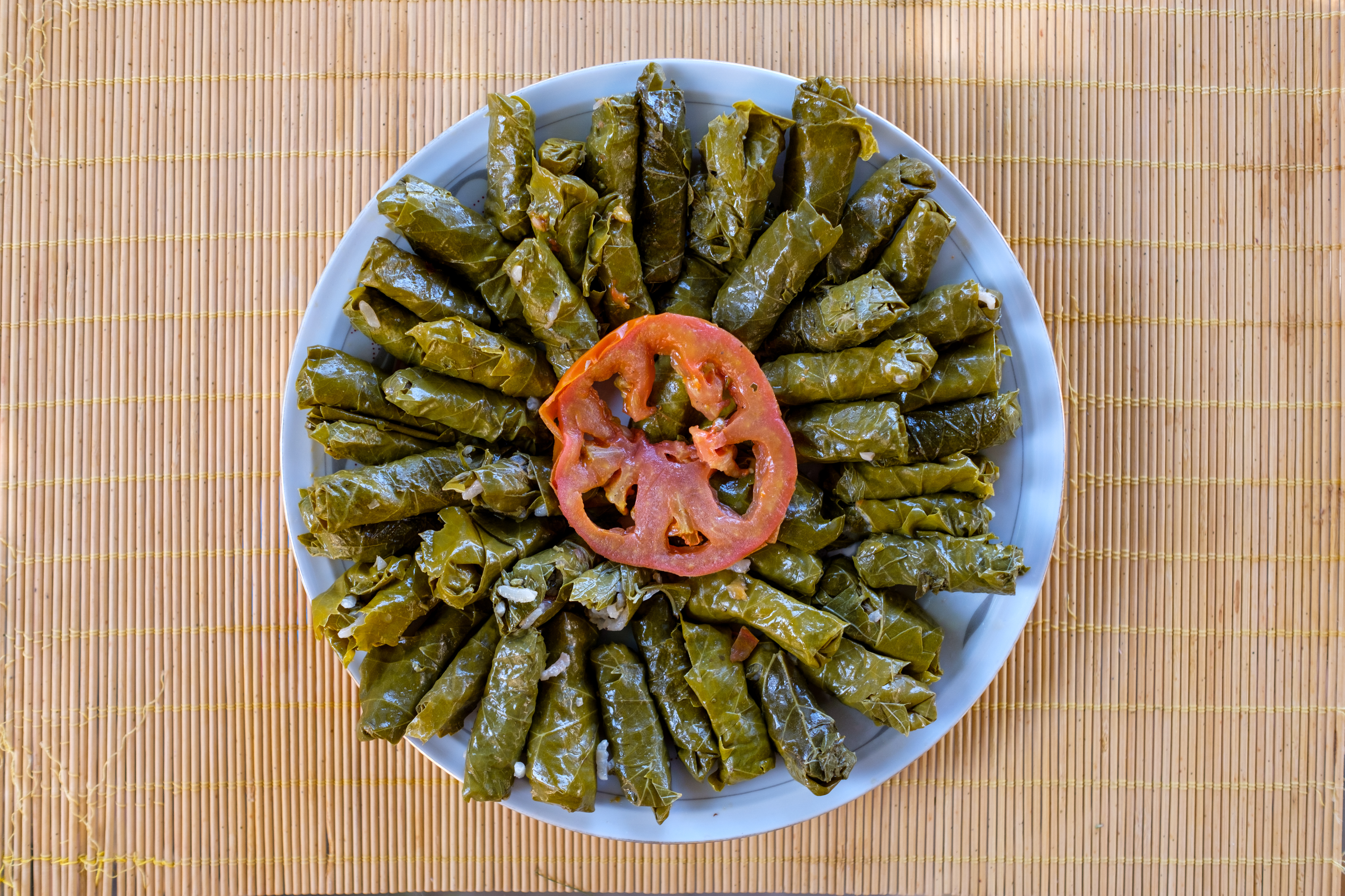 A platter of stuffed grape leaves prepared by Amaline