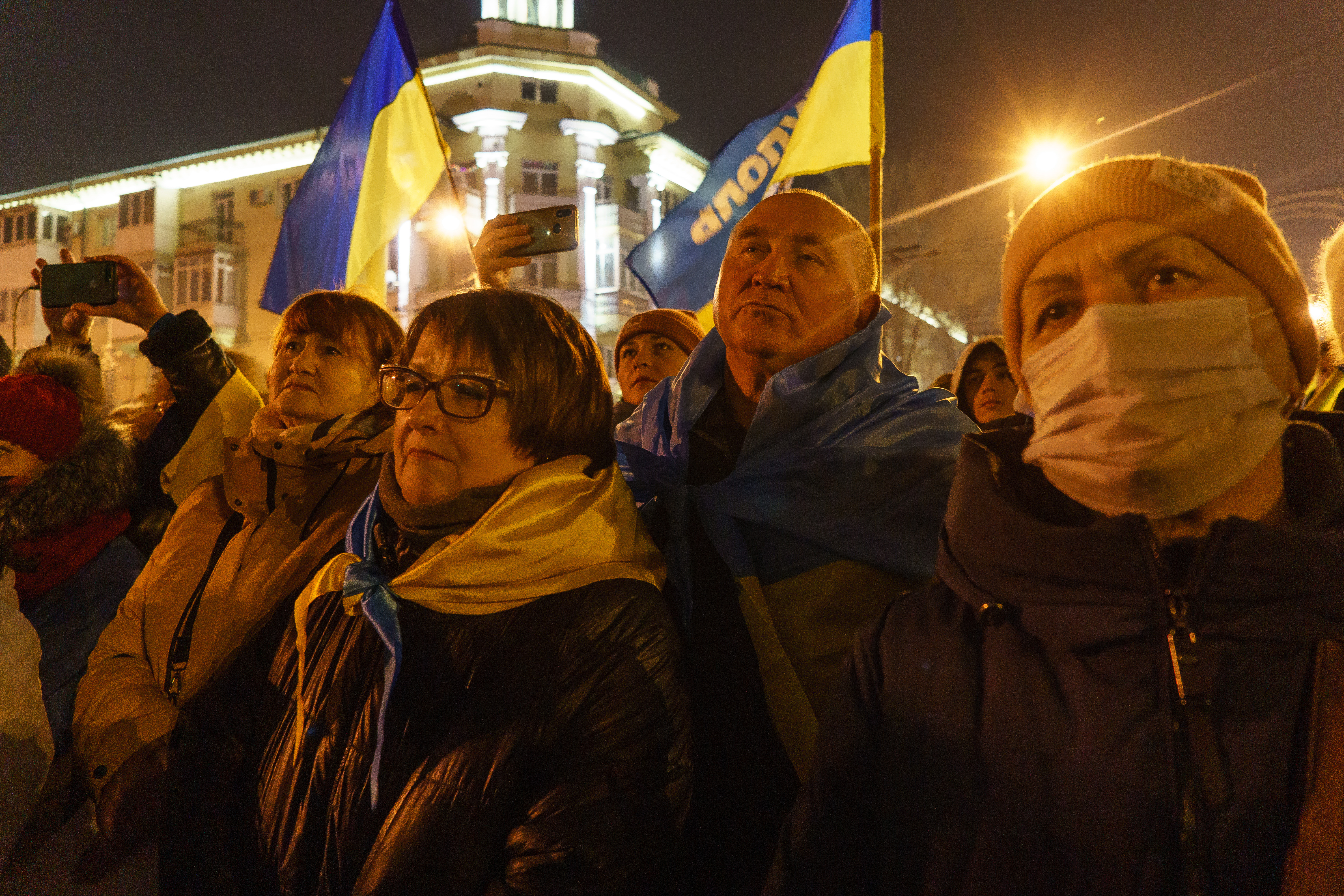 People protesting in front of Donetsk Regional Theatre of Drama in Mariupol after Putin's decision to formally recognize Donetsk and Luhansk regions of Ukraine.