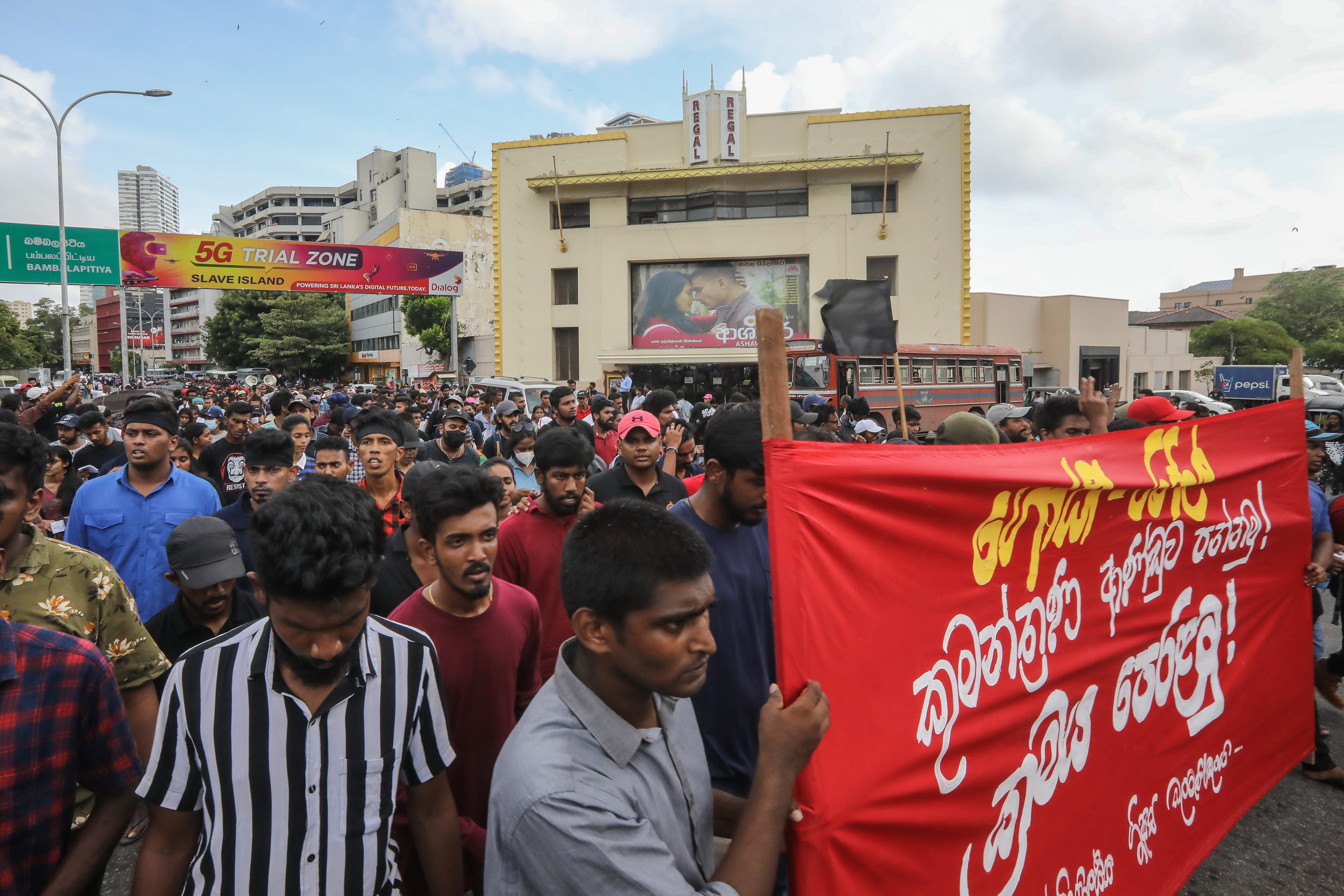 University students attend a protest calling for the resignation of the president