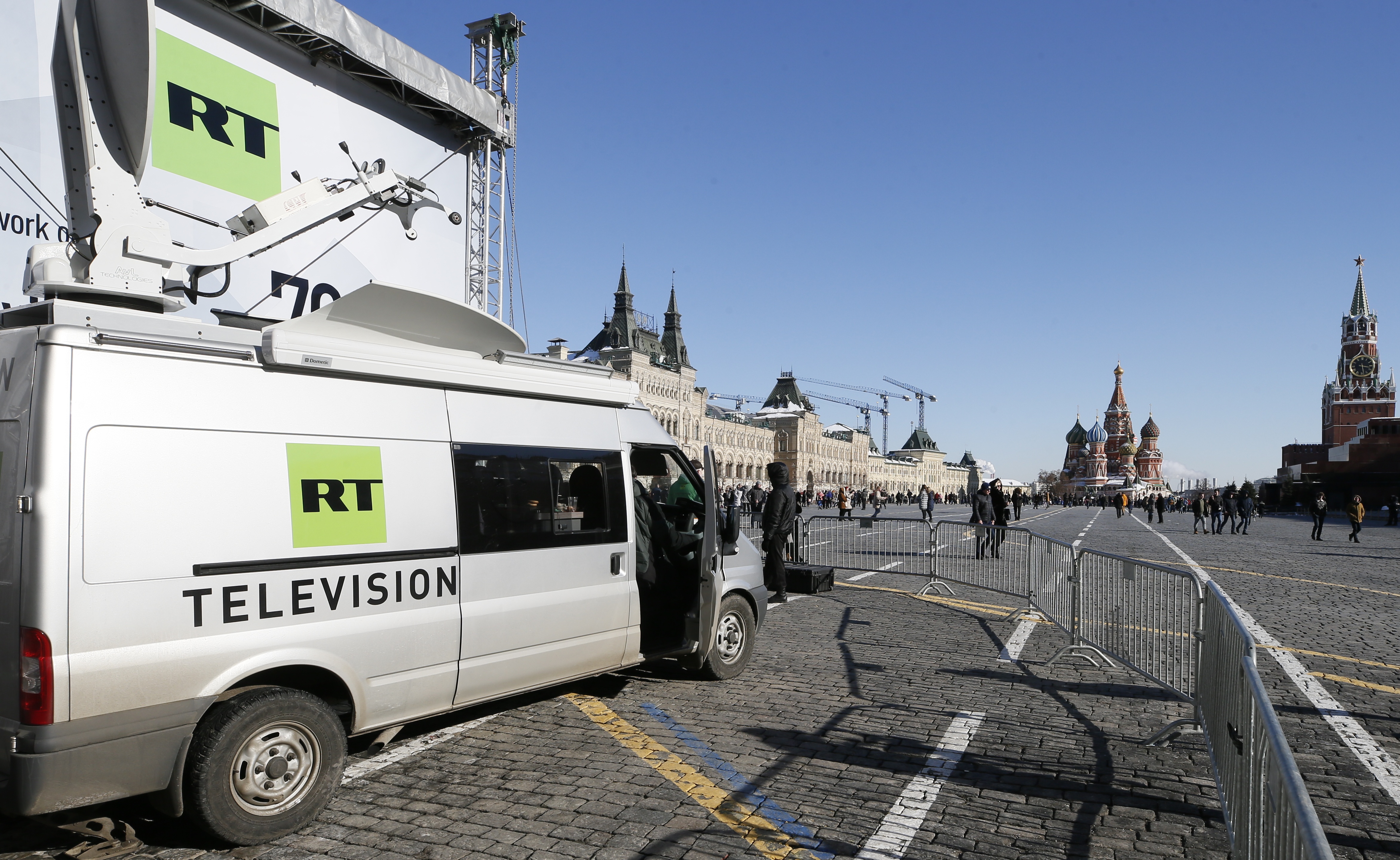 Vehicles of Russian state-controlled broadcaster Russia Today (RT) are seen at Red Square in central Moscow.
