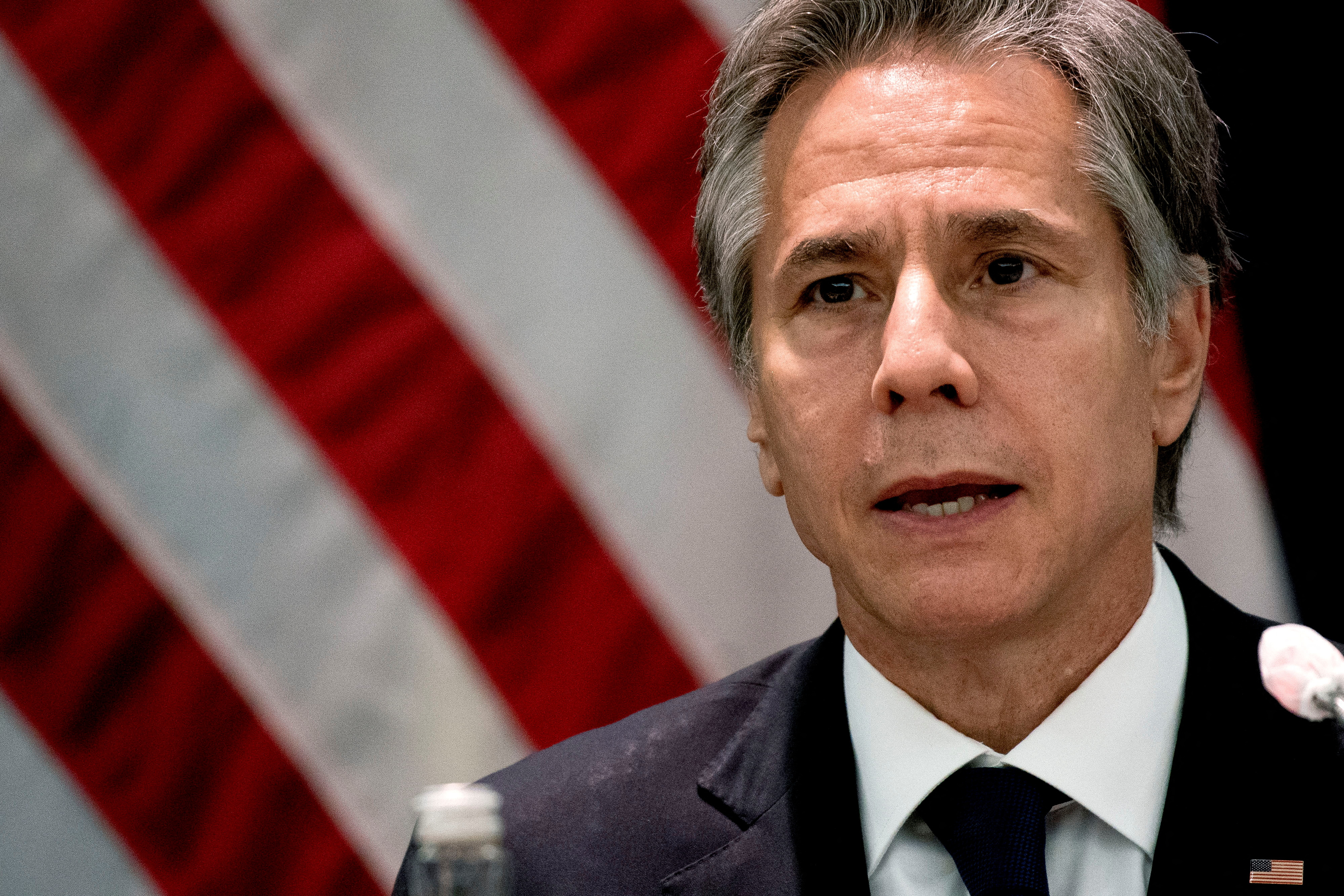 Antony Blinken attends a meeting