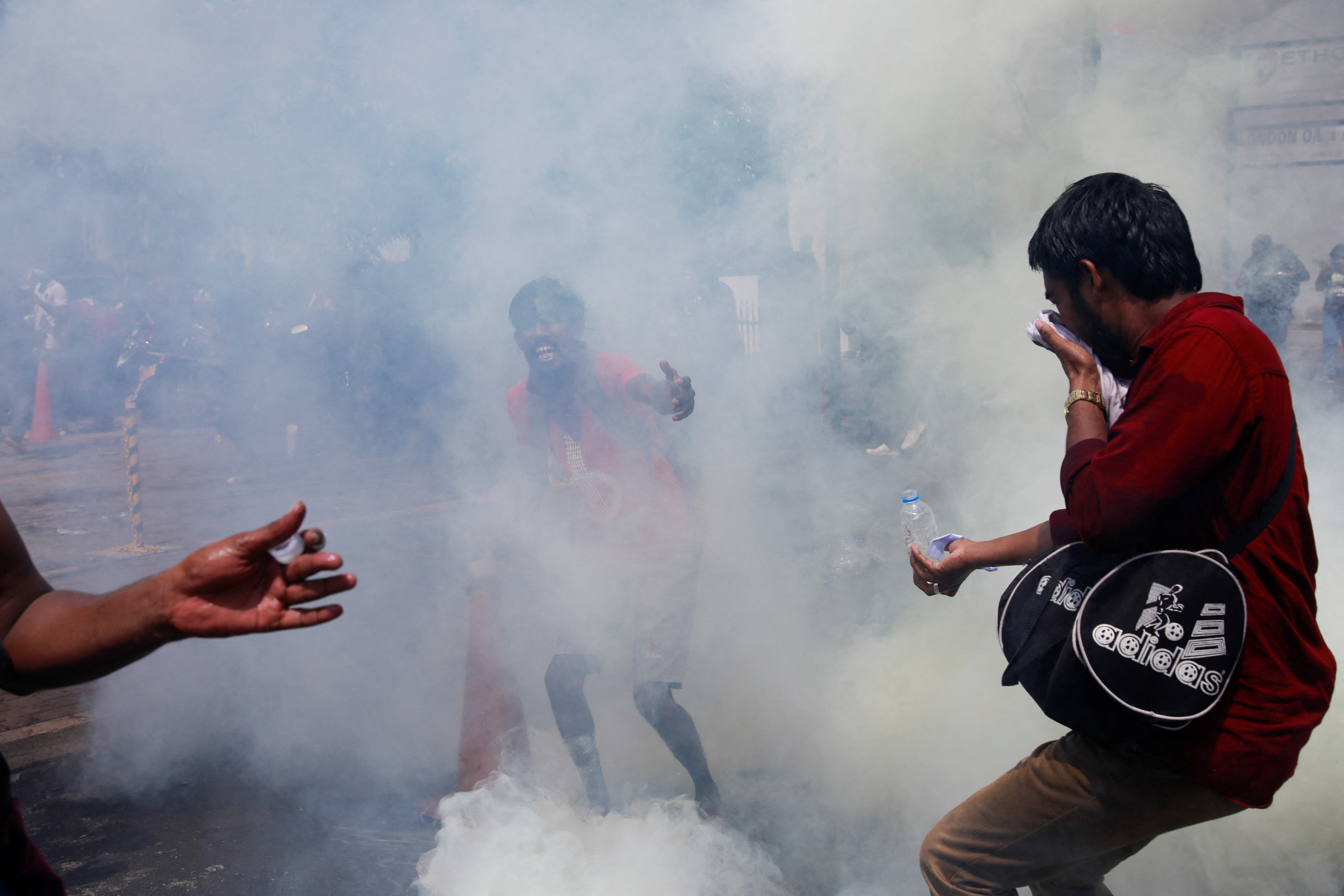 Demonstrators attend a protest outside the office