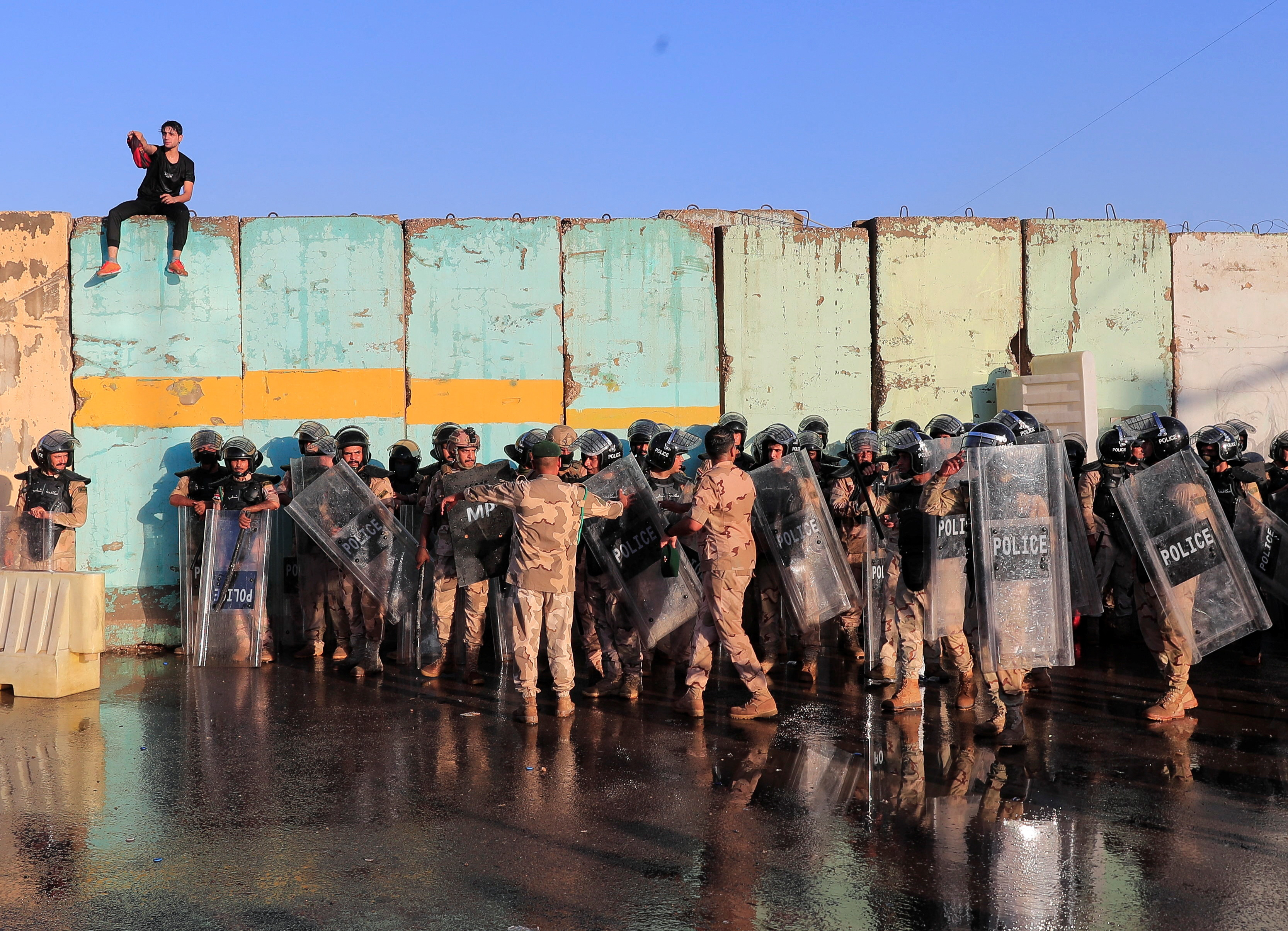 Supporters of the Iraqi cleric Moqtada Sadr gather inside the Iraqi parliament