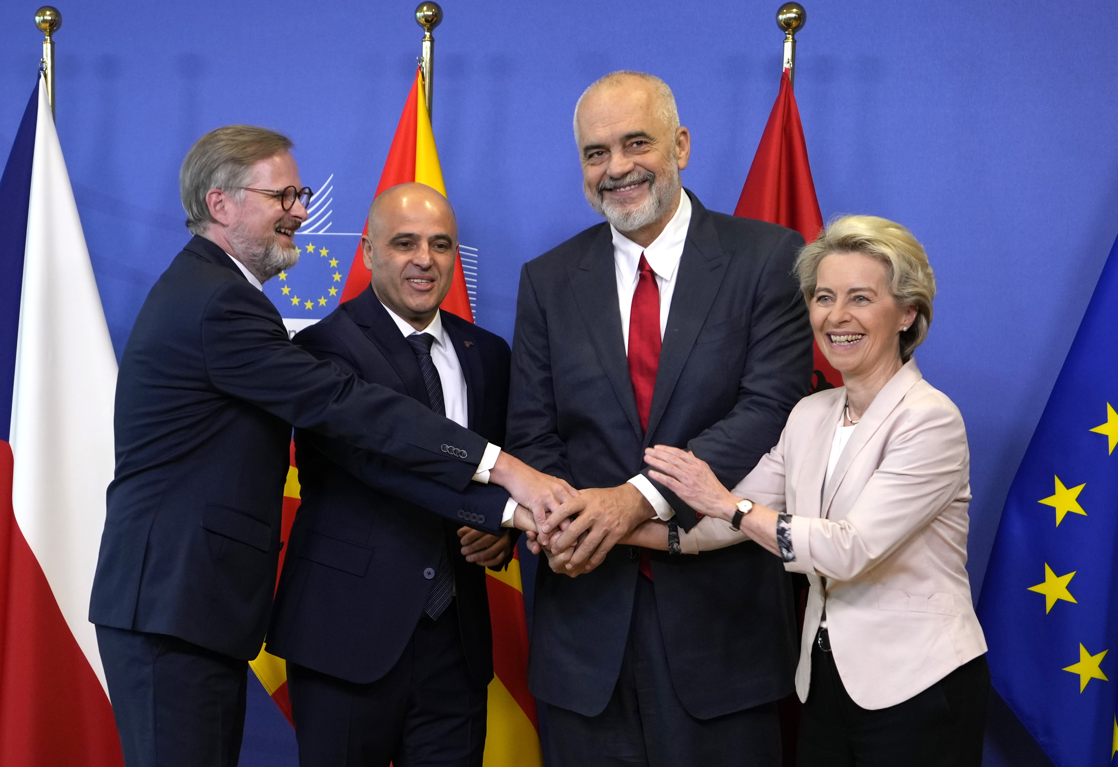 European Commission President Ursula von der Leyen, Albanian Prime Minister Edi Rama, North Macedonia's Prime Minister Dimitar Kovacevski and Czech PM Petr Fiala shake hands.